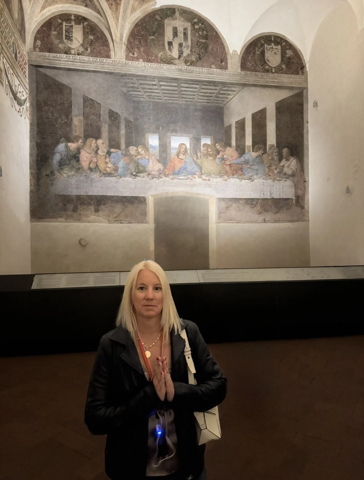 Visitor viewing Leonardo da Vinci Last Supper mural in Milan