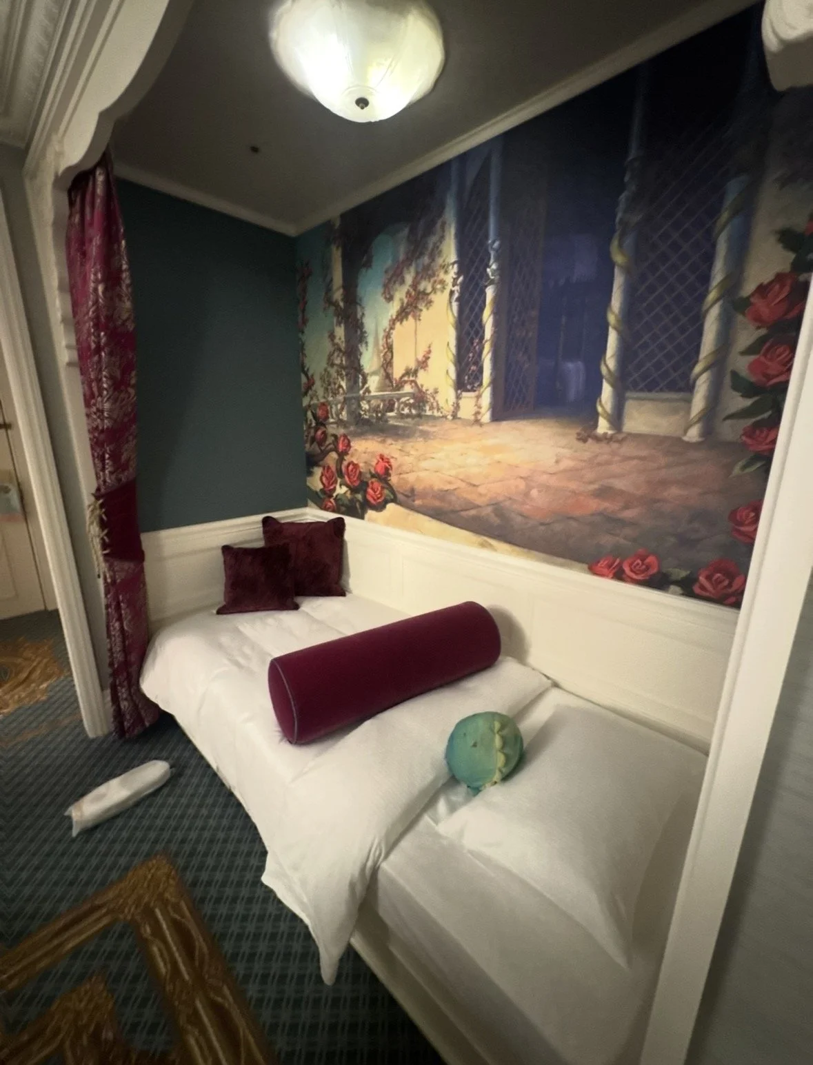 Tokyo Disney signature suite alcove daybed with mural and decorative pillows