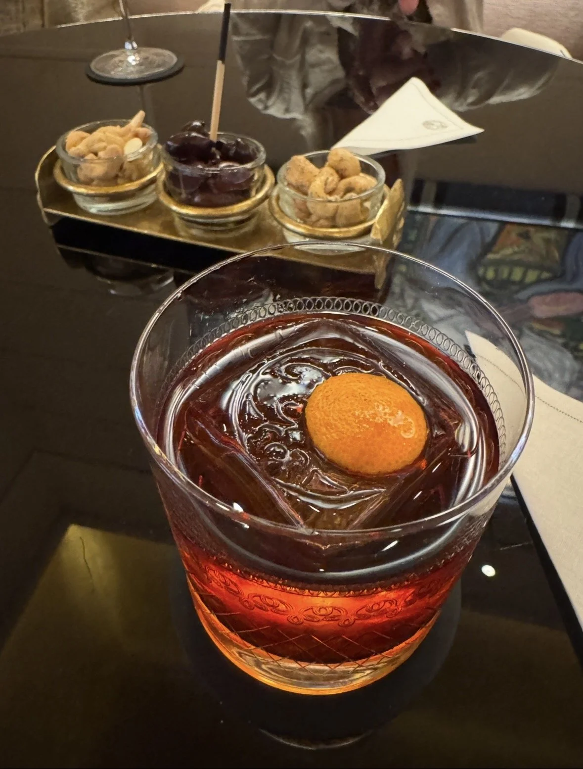 Signature cocktail with bar snacks at Park Hyatt Paris-Vendôme