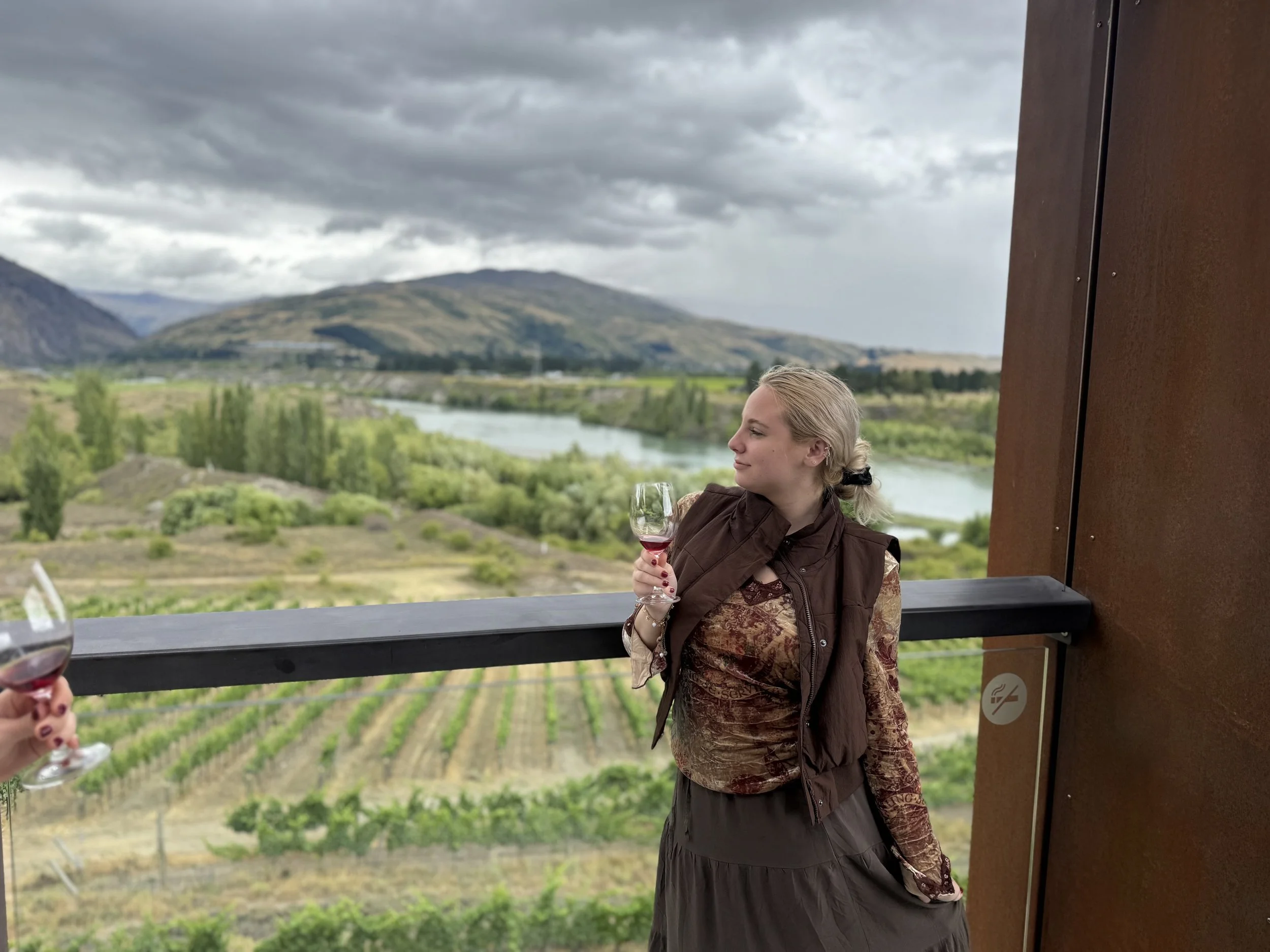Wine tasting overlooking the vineyards at Te Kano Estate in Central Otago