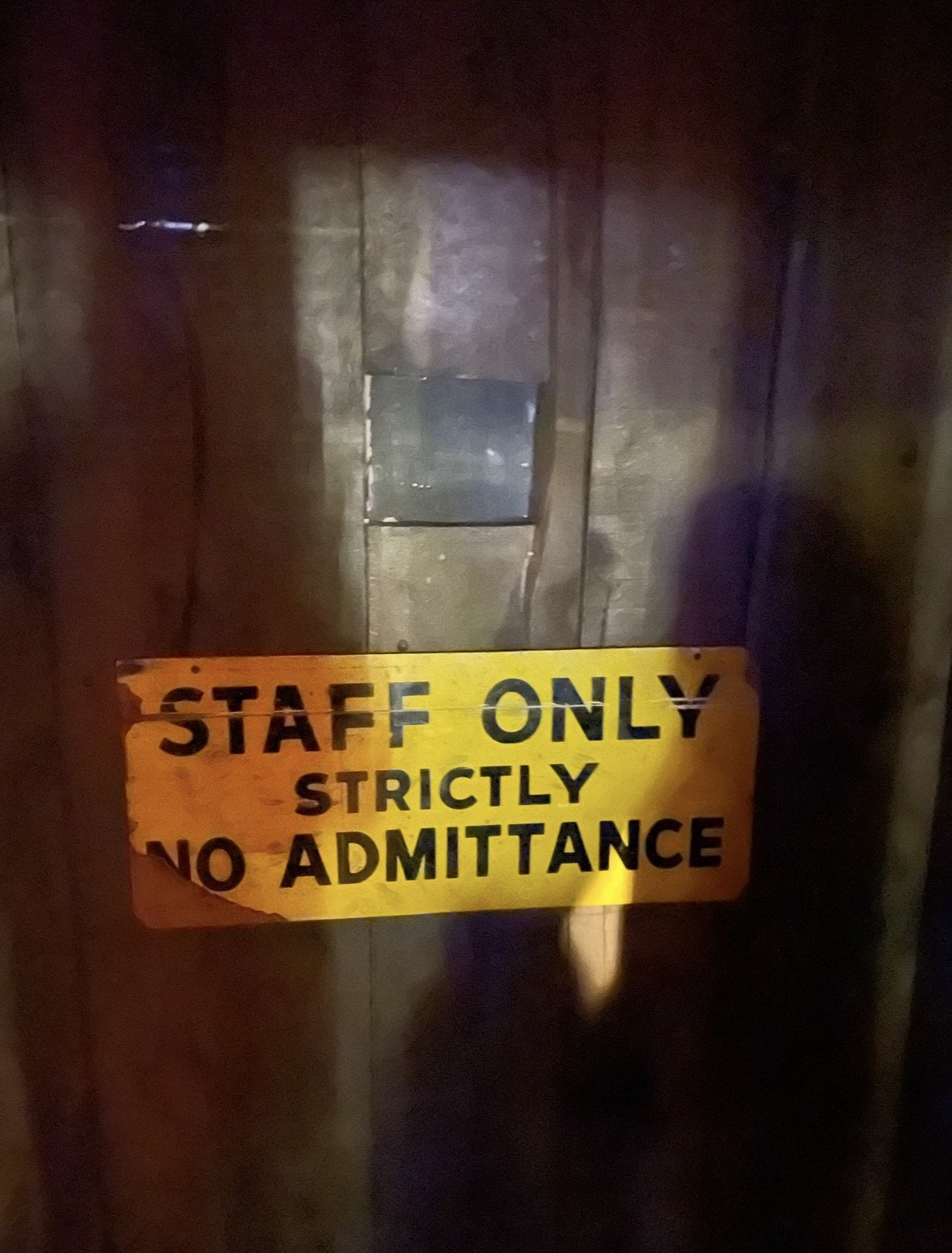 Staff Only sign at the hidden entrance to The Art of Duplicity in Cape Town