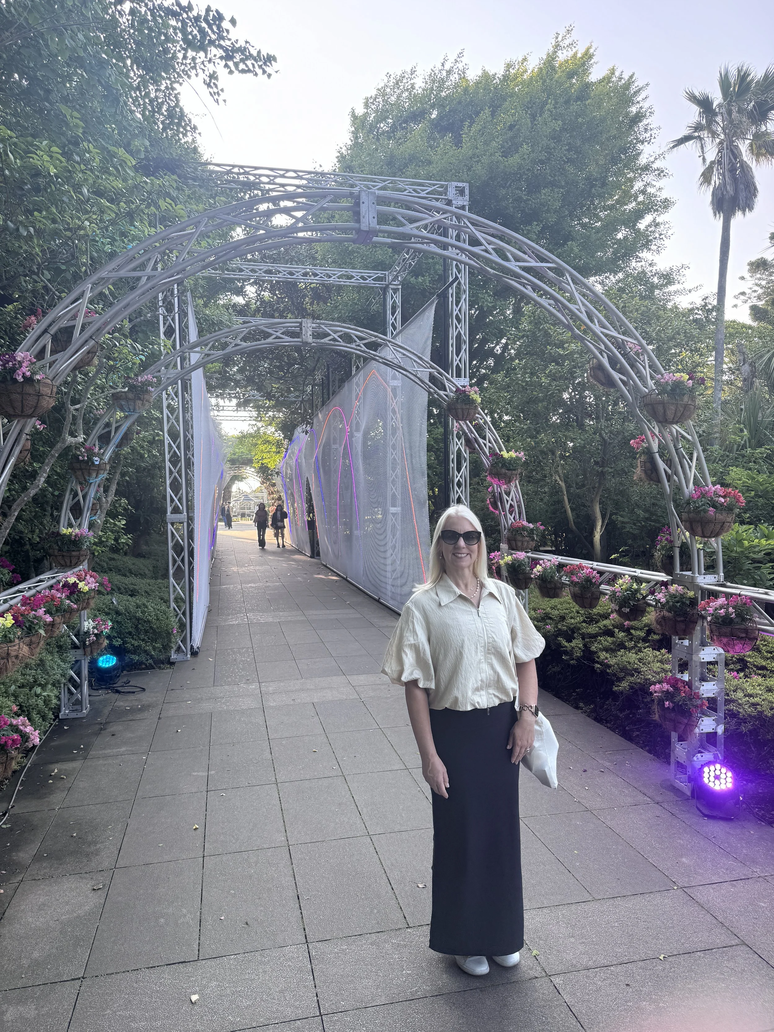Decorative floral archway and garden pathway on Enoshima Island