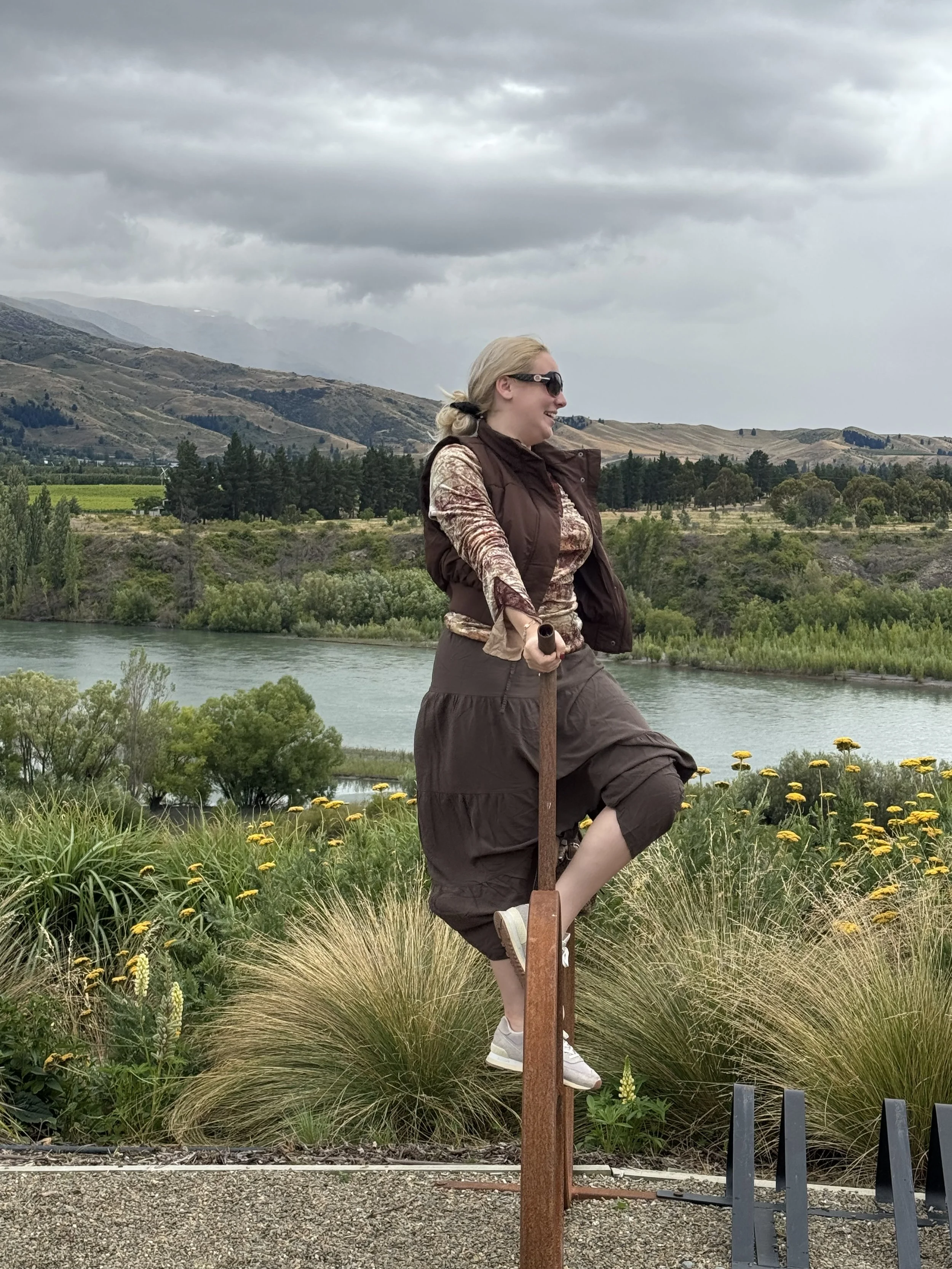 Bicycle sculpture with vineyard and mountain views near Bannockburn Hotel in Central Otago”