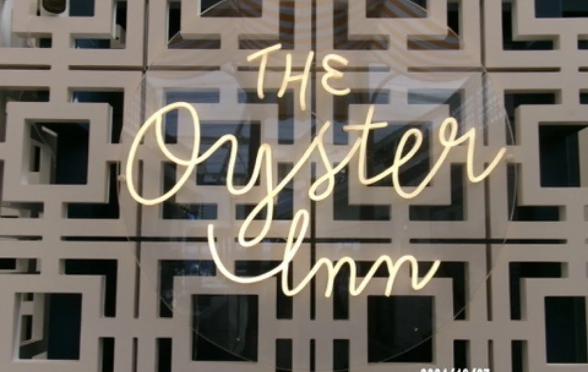 The Oyster Inn sign at the waterfront restaurant in Oneroa on Waiheke Island