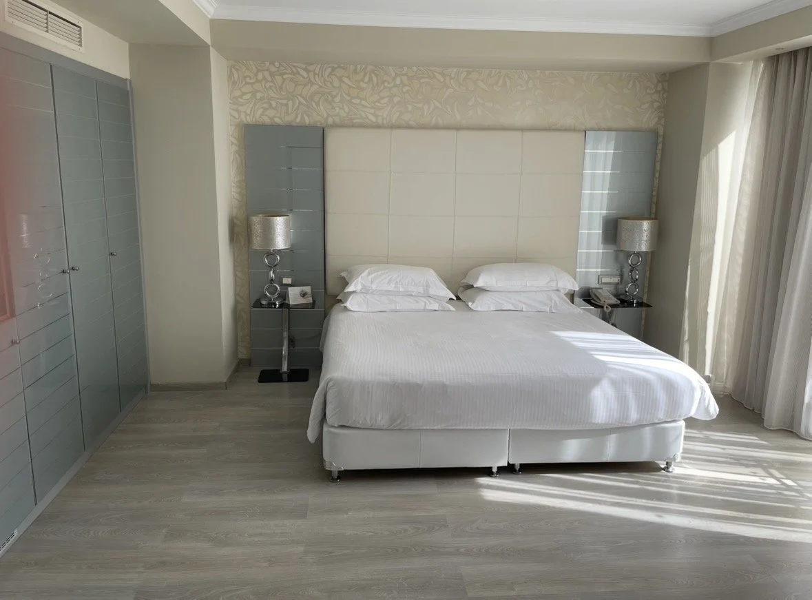 Bedroom inside a private pool suite at Atrium Platinum Luxury Resort.