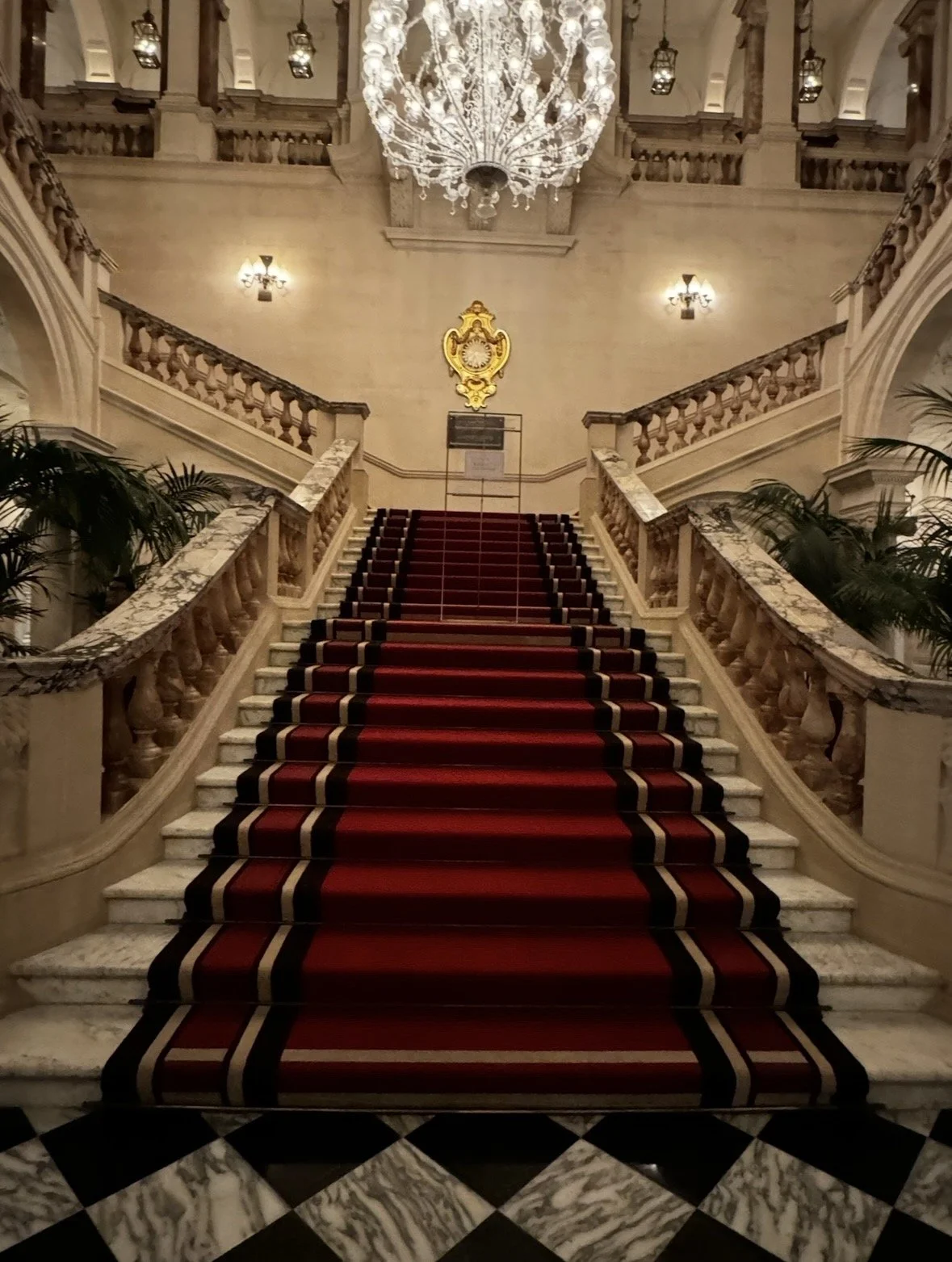 Grand staircase inside Raffles London at The OWO, home of Spy Bar