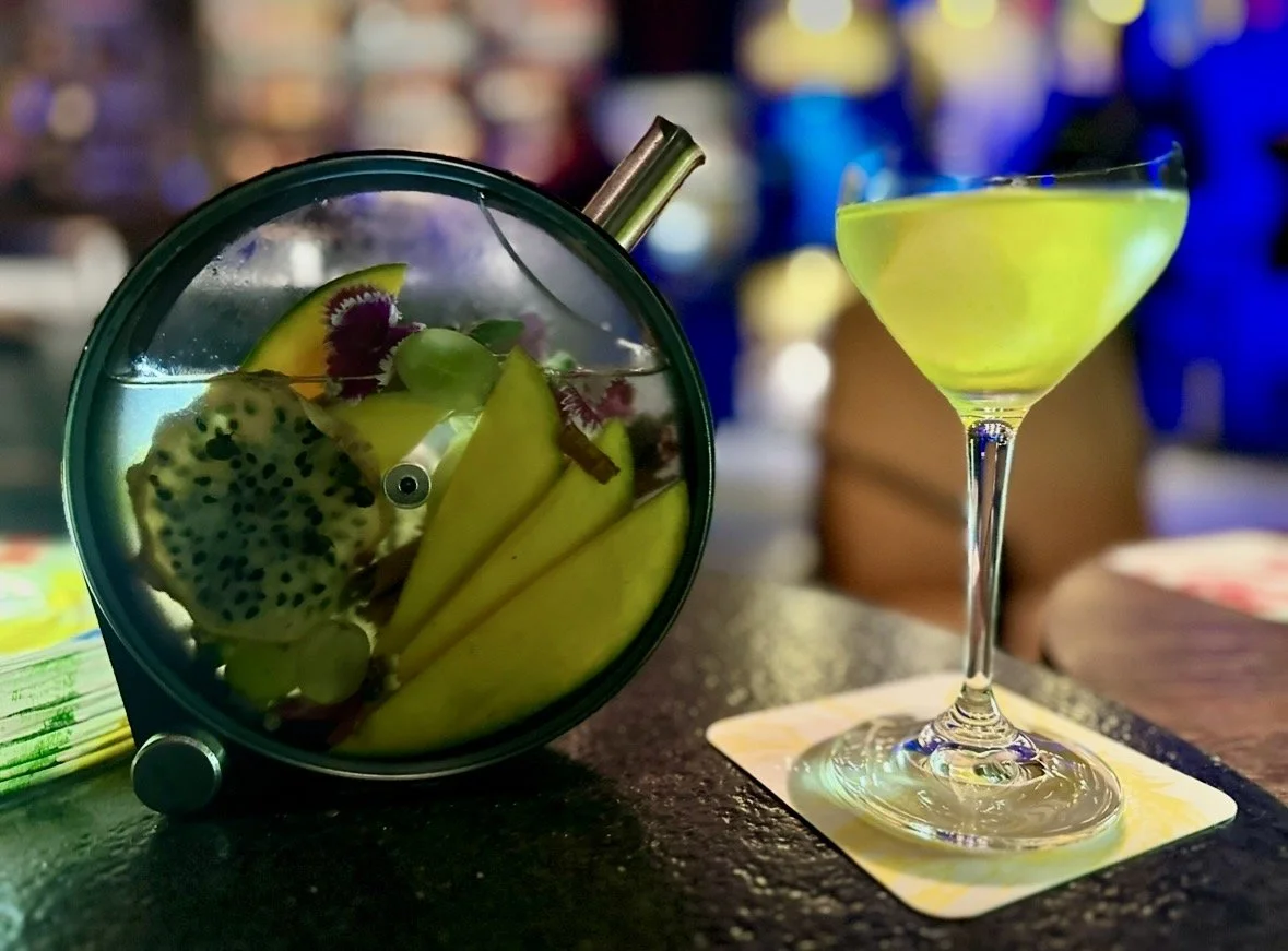 Signature cocktails at Carnaval Bar in Lima, Peru, showcasing creative pisco-based drinks with artistic presentation.