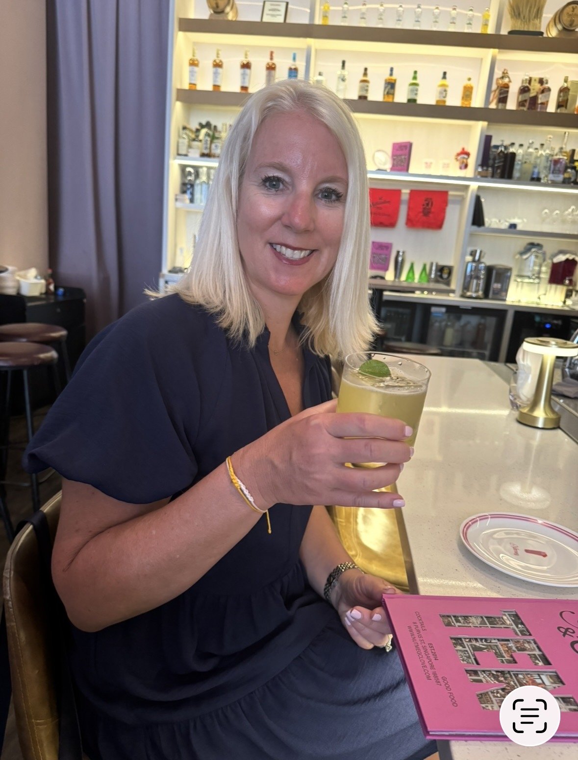 Enjoying a signature cocktail at Nutmeg and Clove Singapore