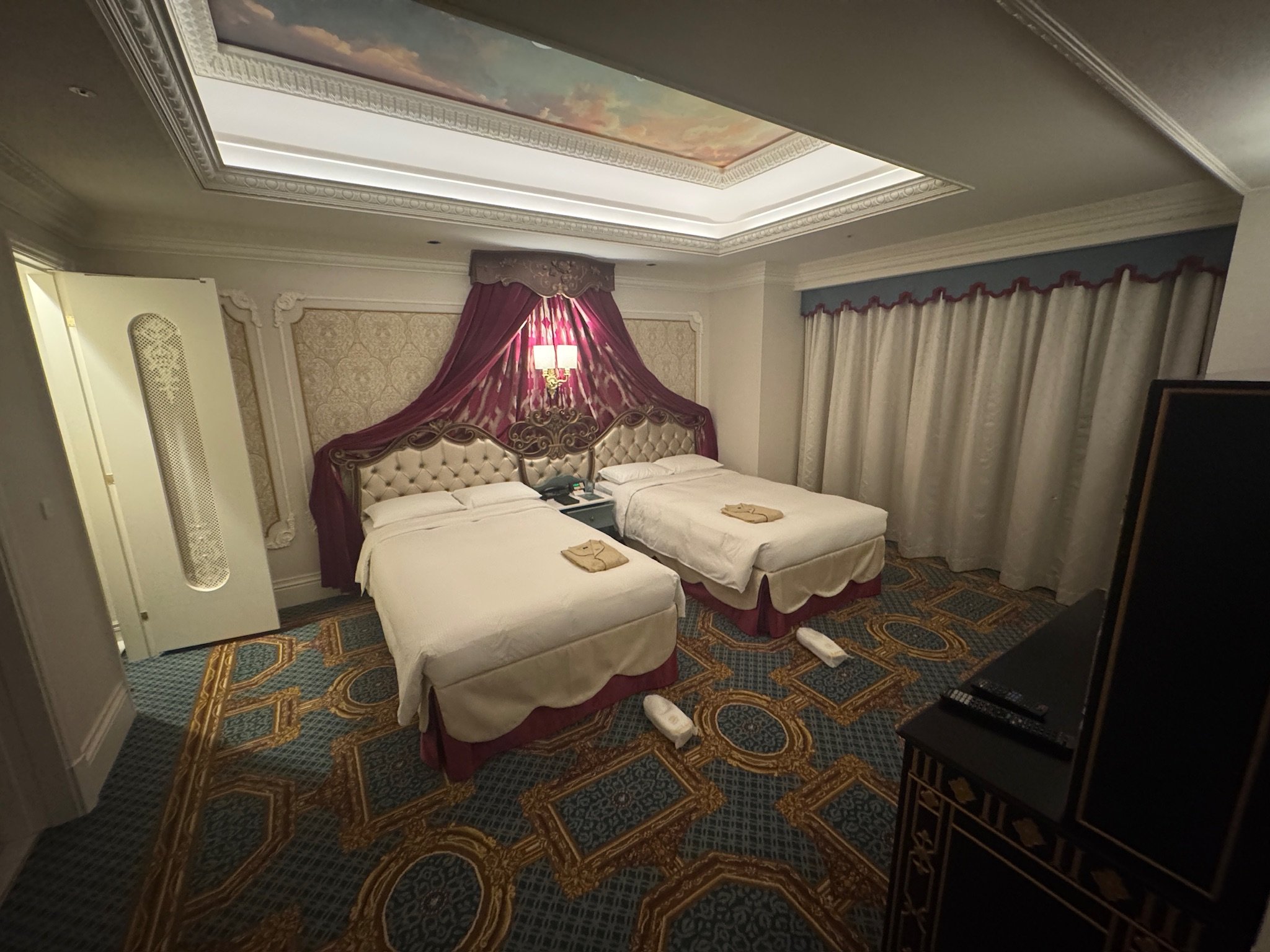 Tokyo Disney signature suite bedroom with canopy beds at Fantasy Springs Hotel