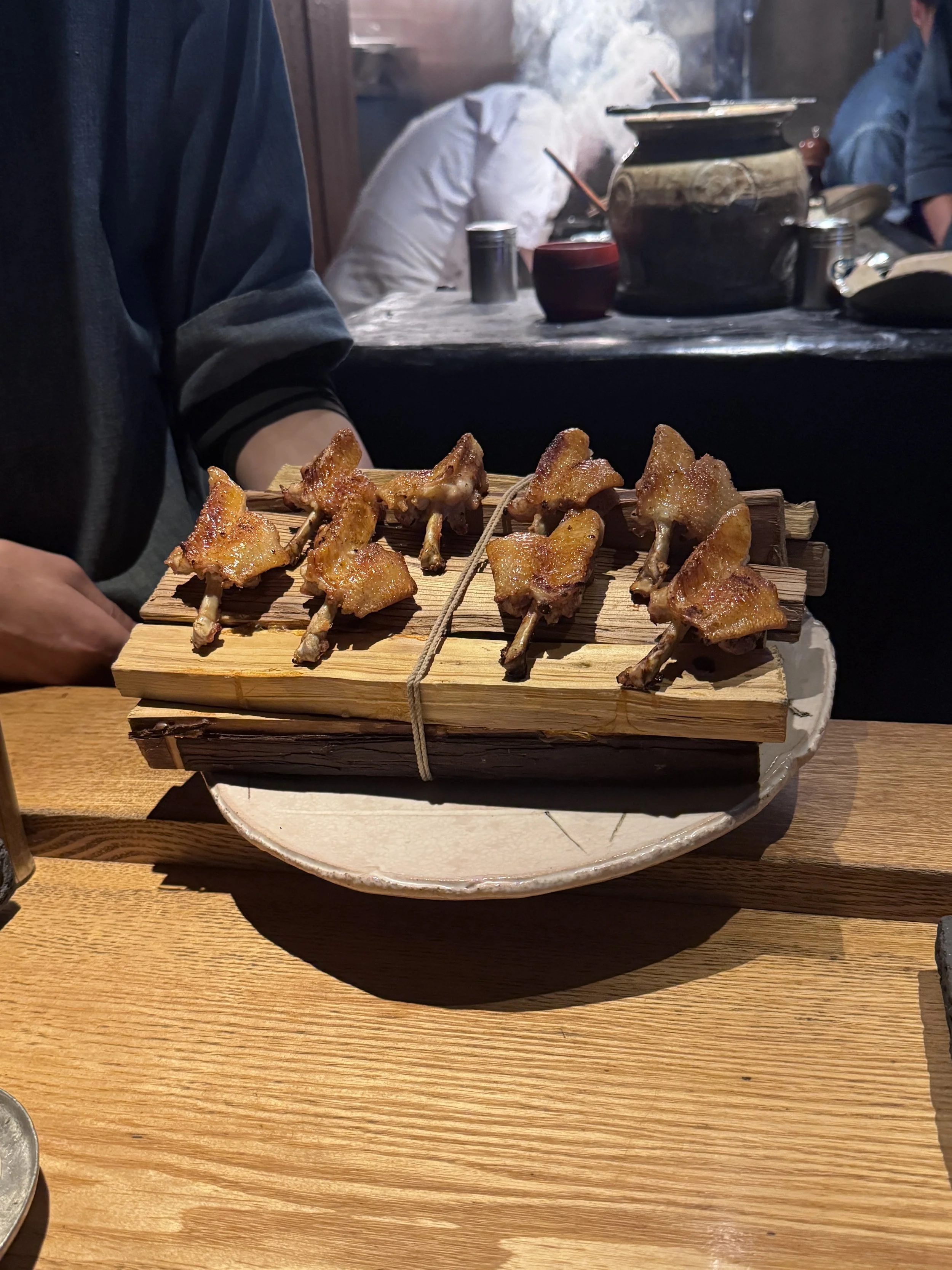 Yakitori tasting course featuring charcoal-grilled chicken skewers at Yakitori Ichimatsu.