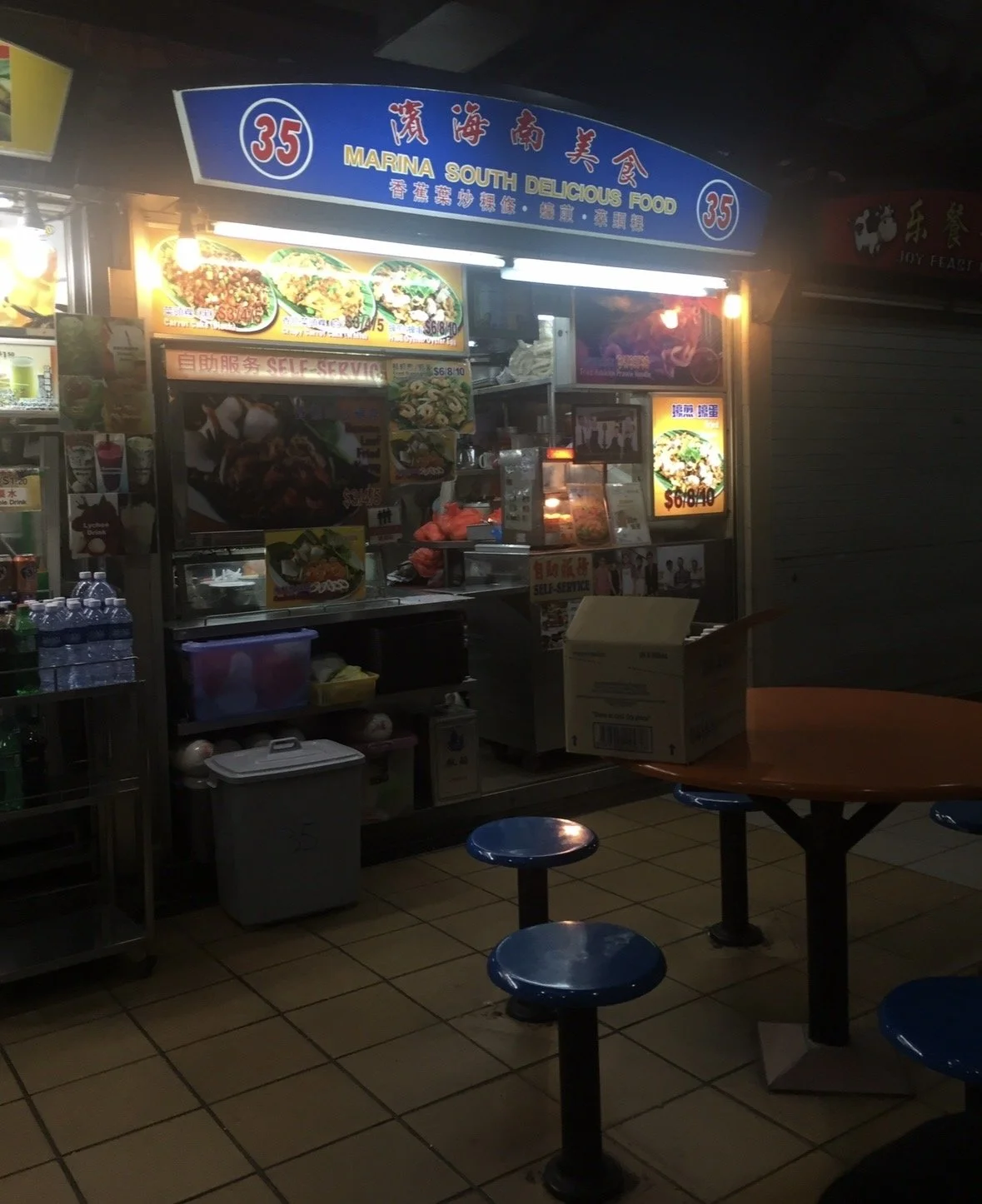 Marina South Delicious Food hawker stall at a Singapore hawker centre serving local Chinese dishes