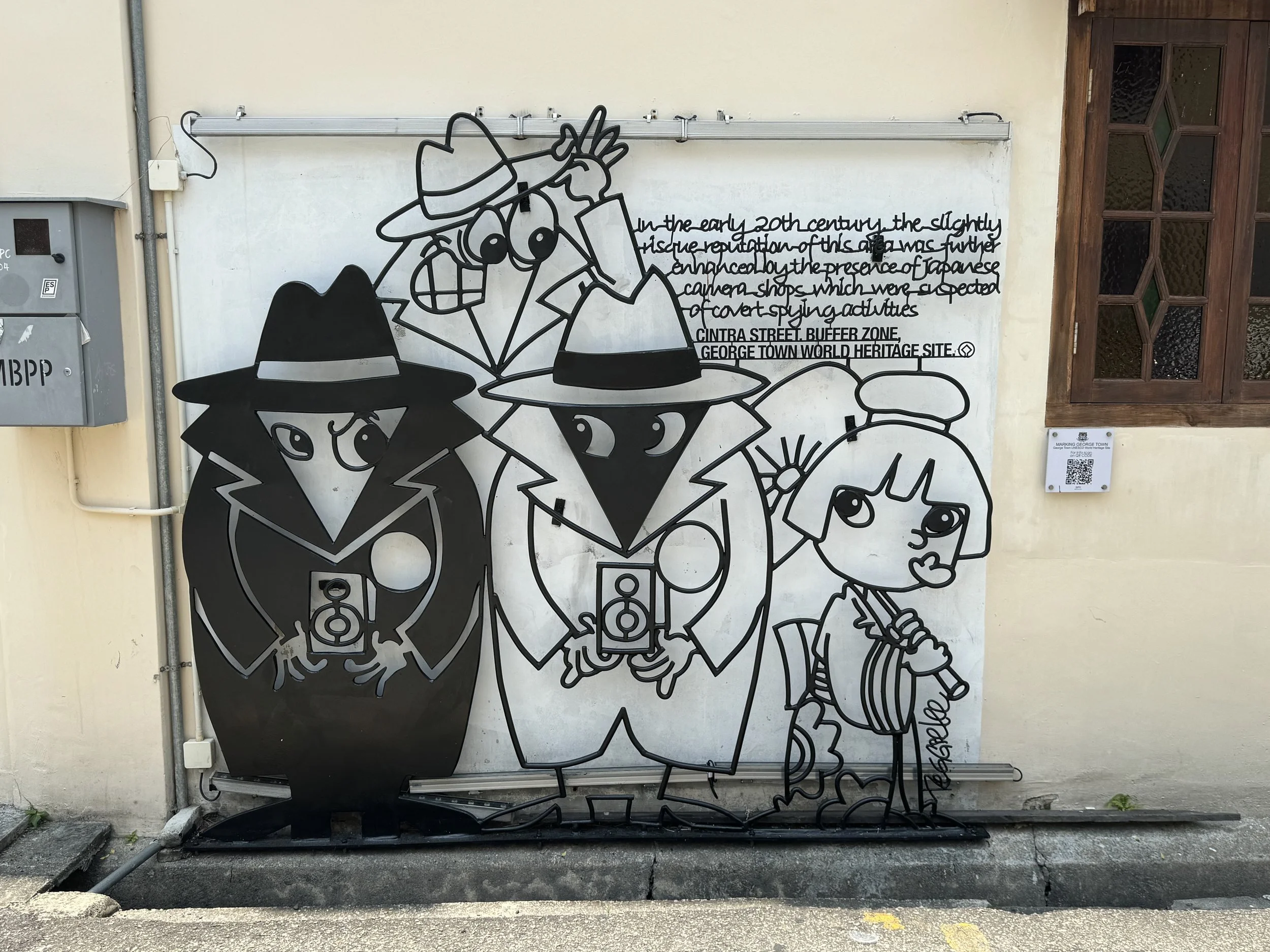 Wire sculpture depicting photographers in George Town Penang