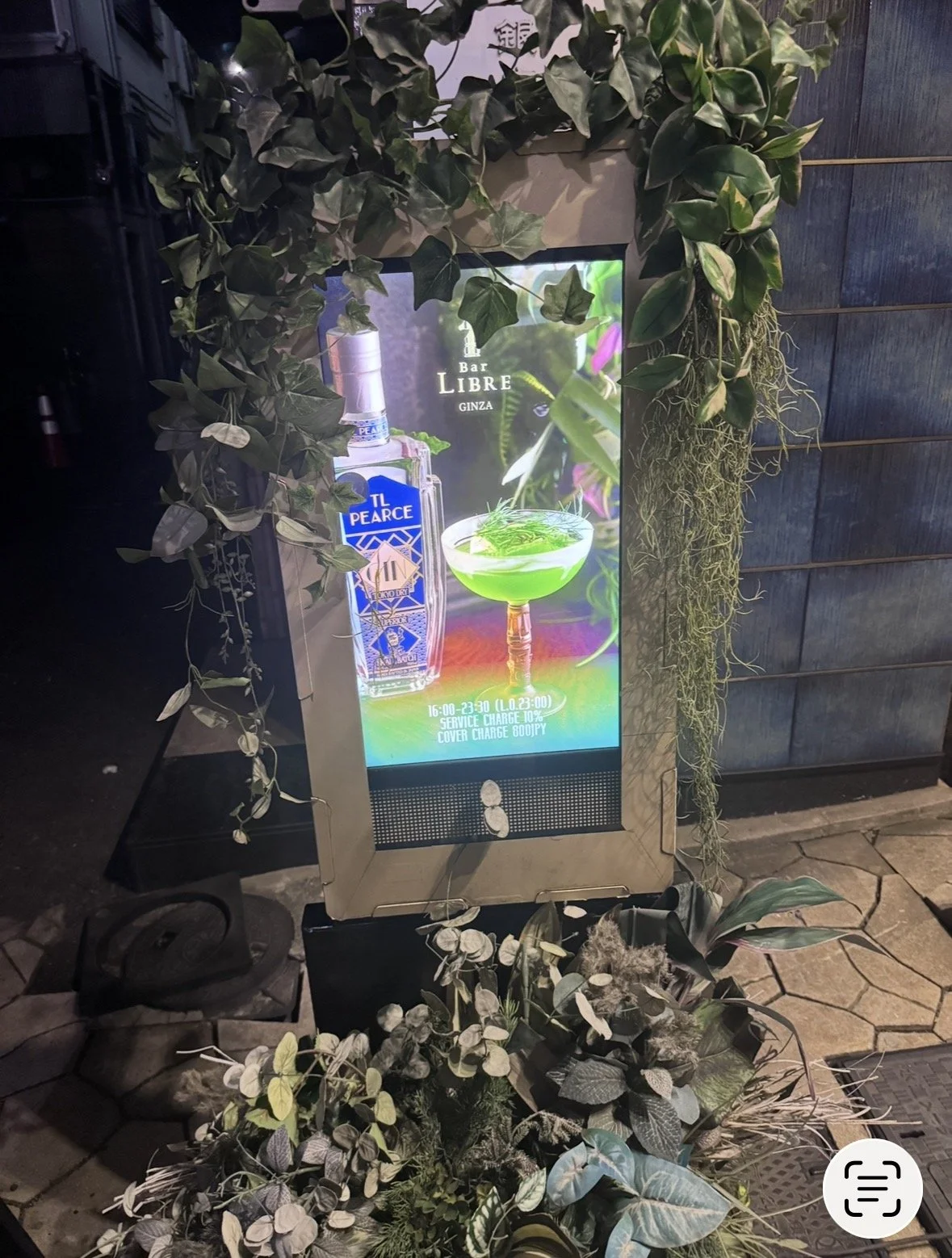 Plant-covered Bar Libre Ginza sign outside the cocktail bar in Tokyo