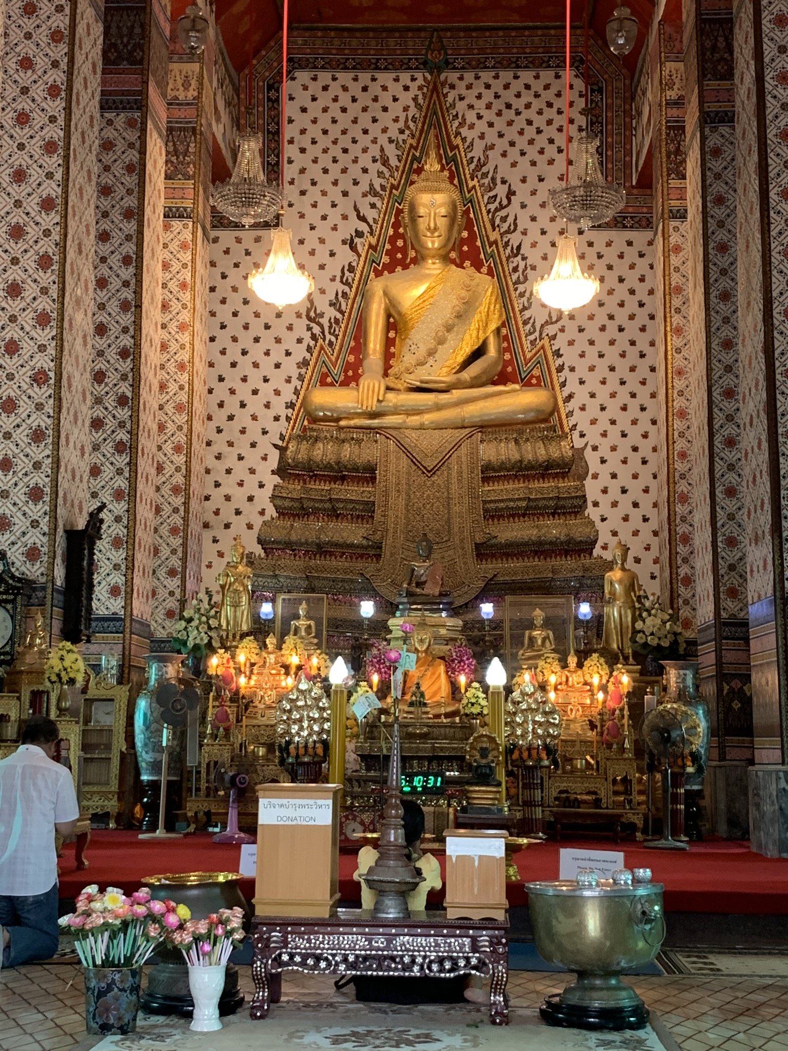 Golden Buddha inside Wat Arun temple in Bangkok