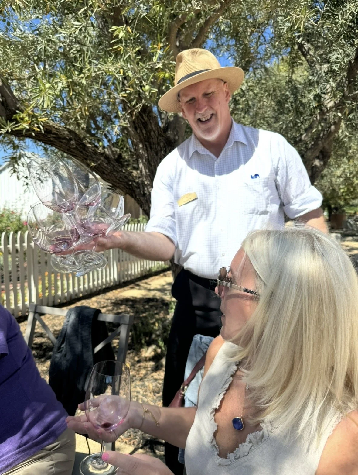 Outdoor wine tasting under the olive trees at Nickel & Nickel winery