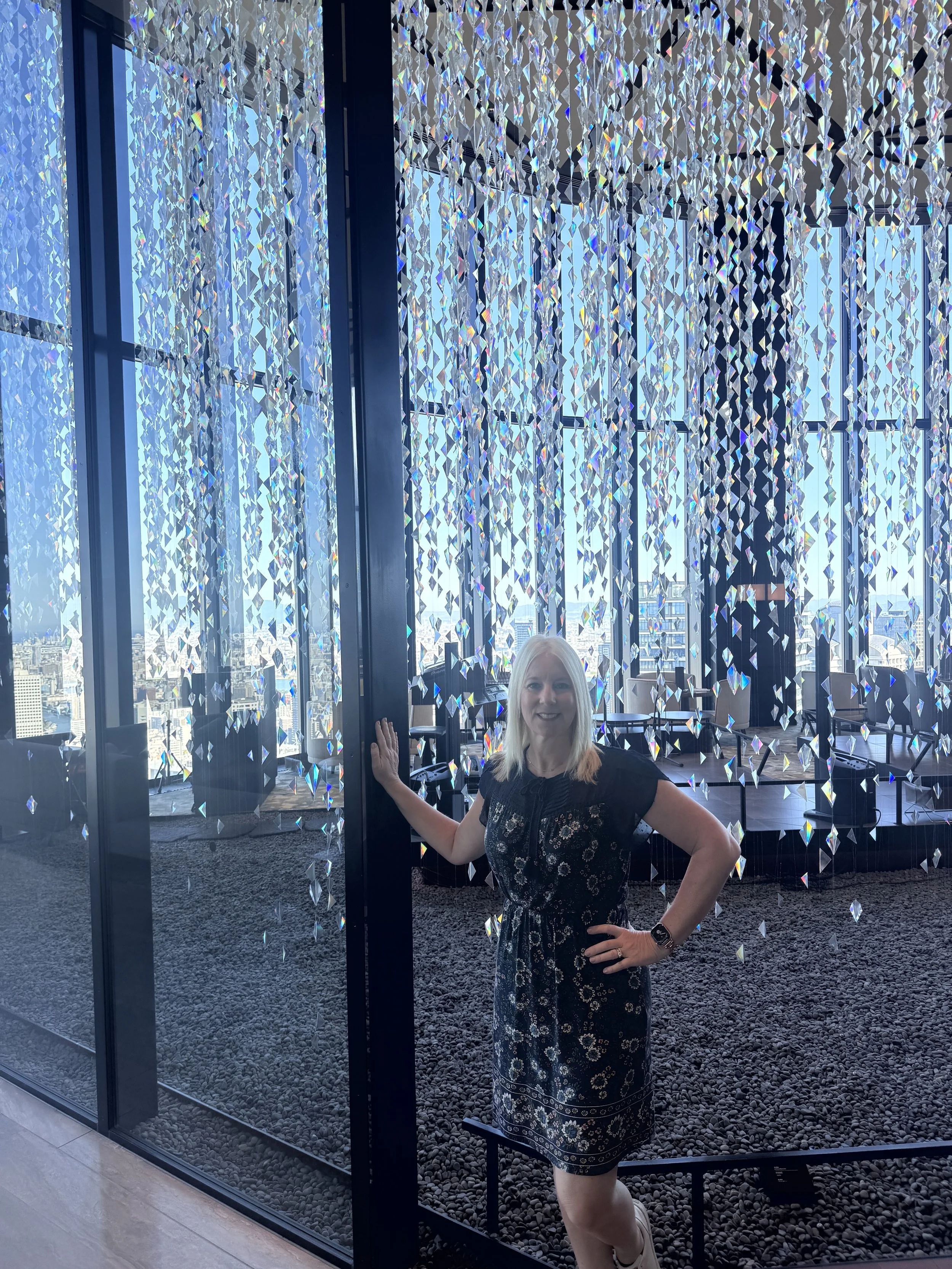 Conrad Osaka lobby with dramatic floor-to-ceiling windows and modern luxury design