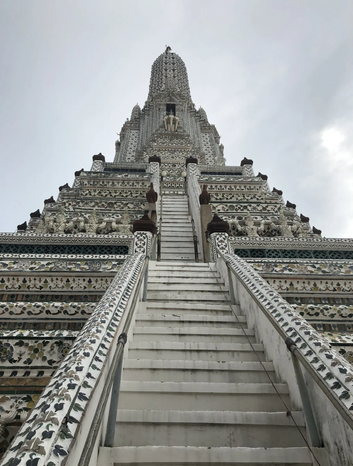 Steep staircase leading up Wat Arun Temple in Bangkok Thailand