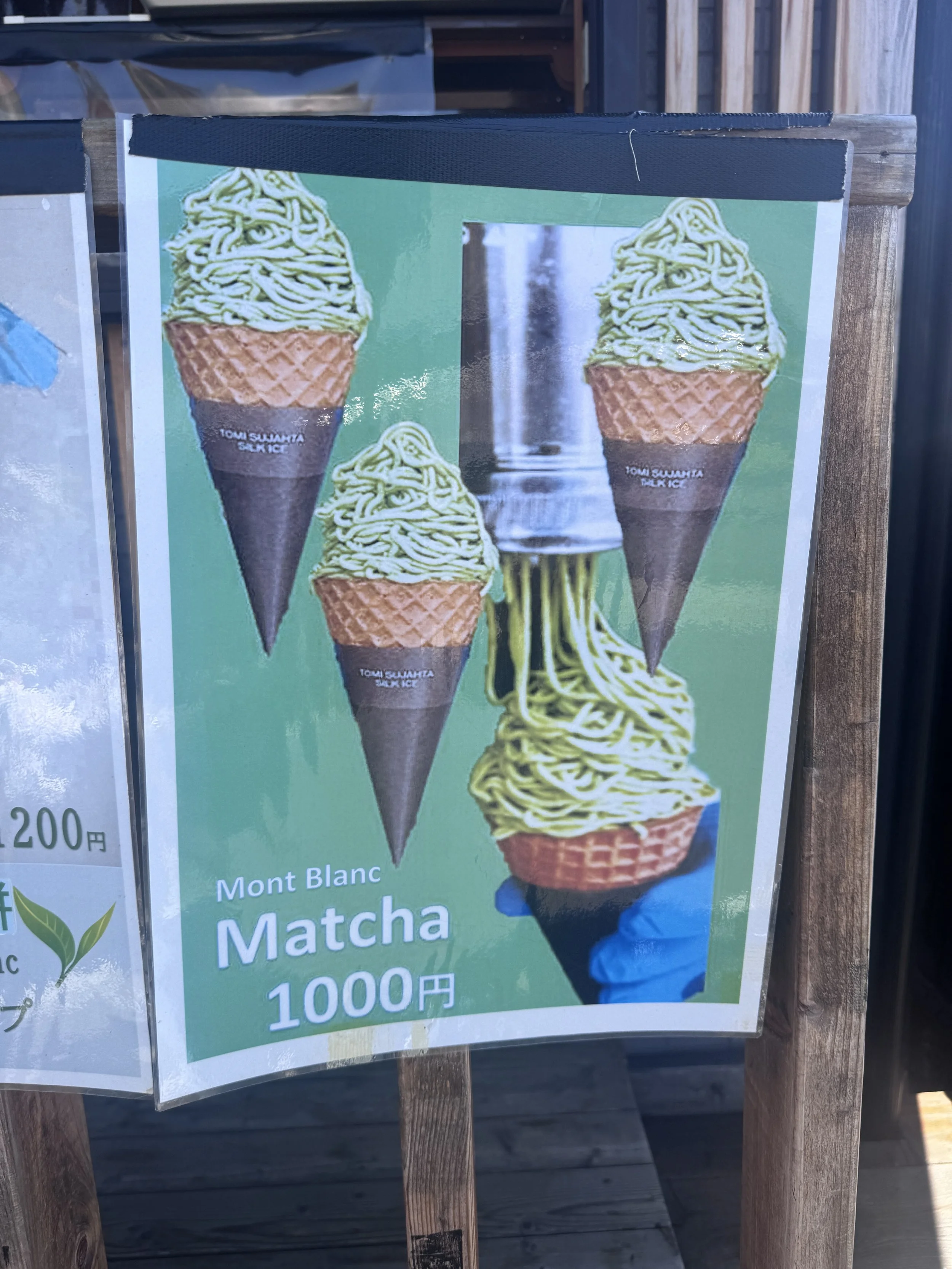 Matcha dessert display outside a shop in Uji