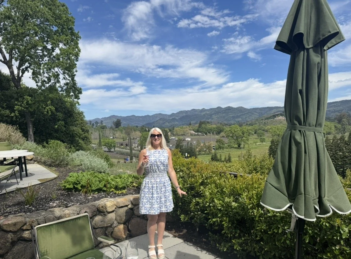 Outdoor wine tasting with mountain views at Faust Haus in Napa Valley
