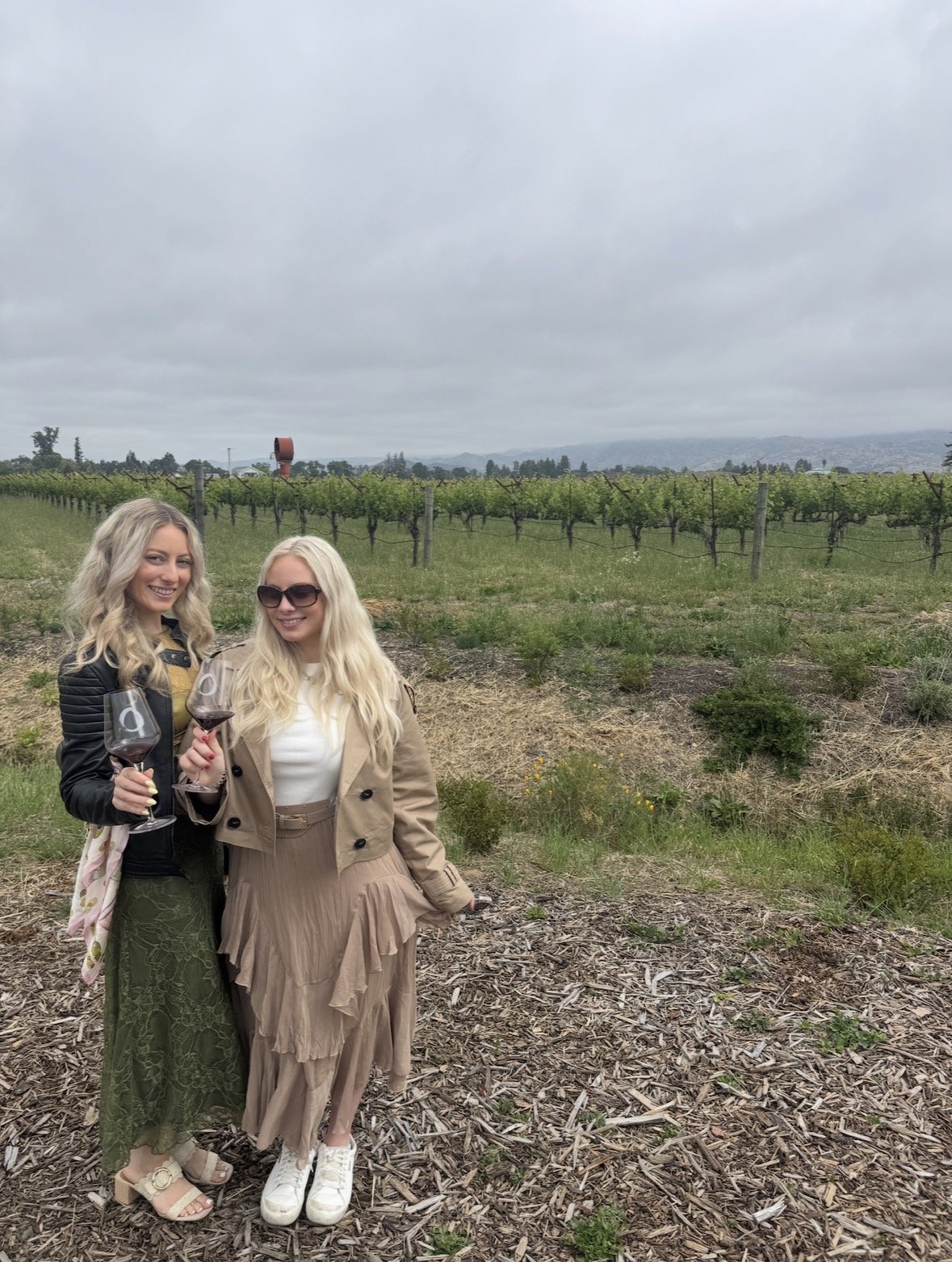 Guests tasting O’Brien Estate wine among the vineyards of Napa Valley’s Oak Knoll District
