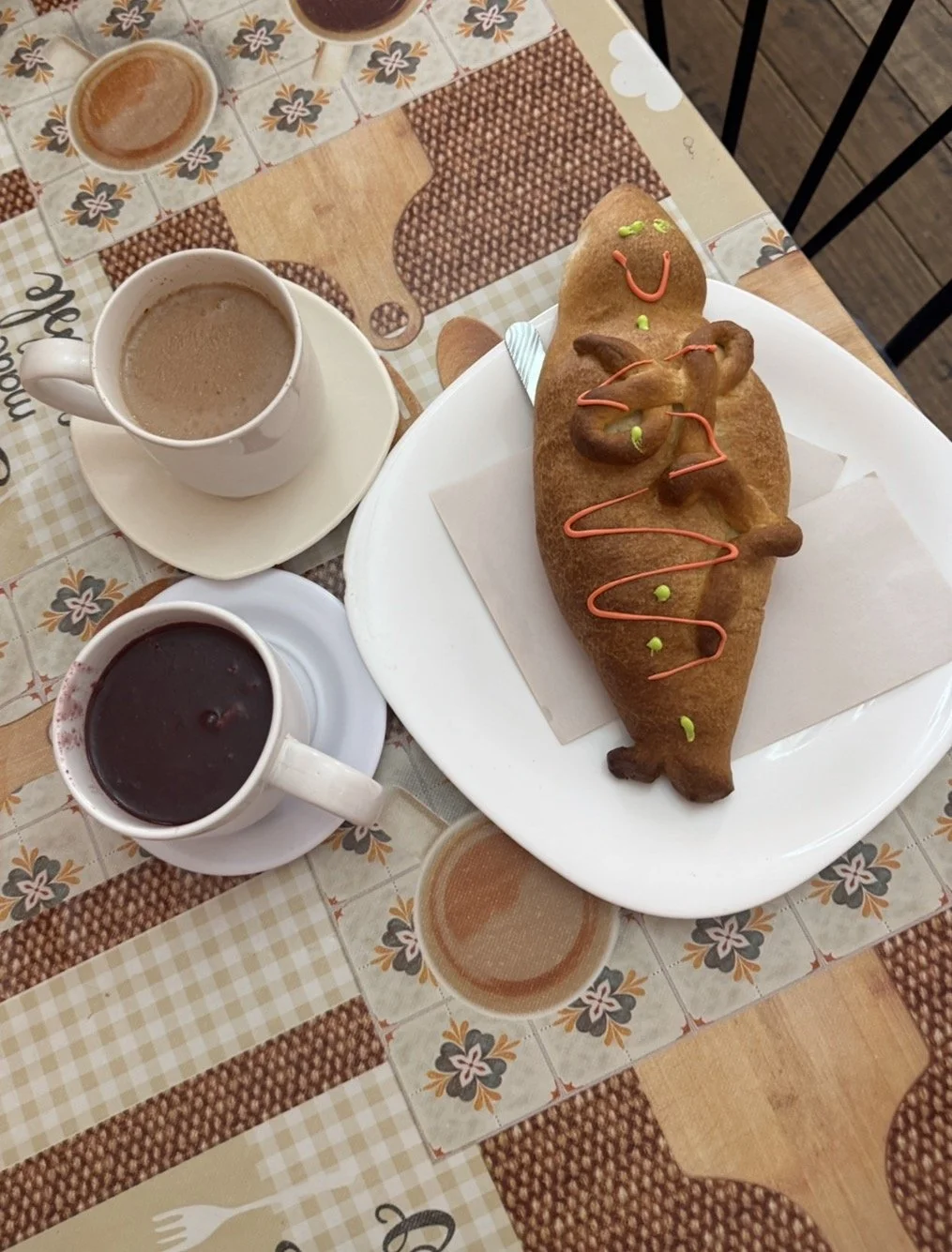 Freshly baked Pan de Ambato served with traditional Ecuadorian drinking chocolate at Chocolate de la Abuela in Quito