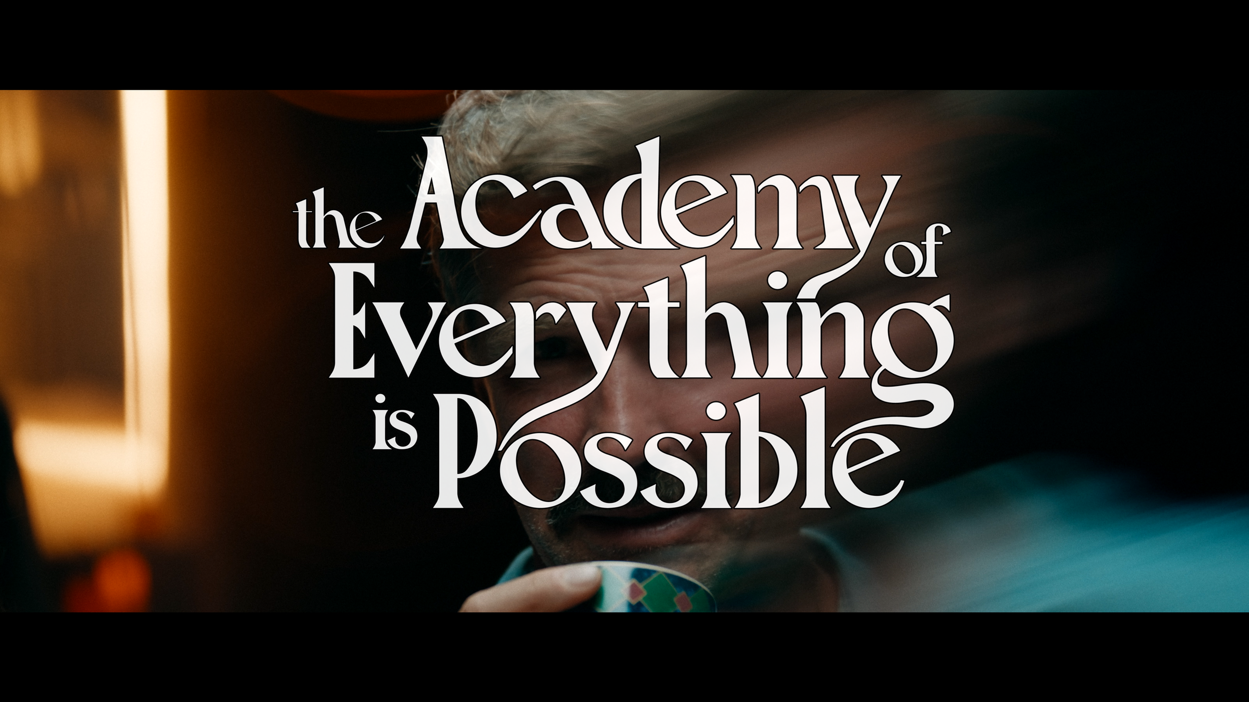 Paul Greene, starring in upcoming feature film with the text 'the Academy of Everything is Possible' overlaid.