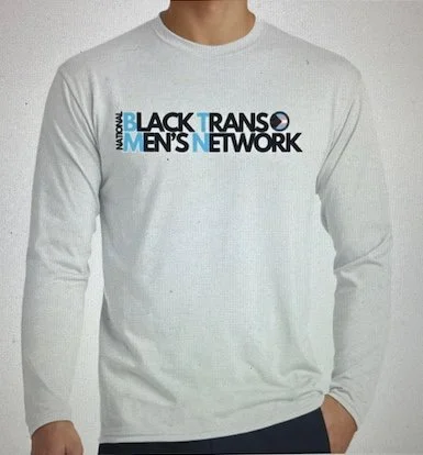 Person wearing a white long-sleeve shirt with the logo of the Black Men's Transgender Network printed on it.