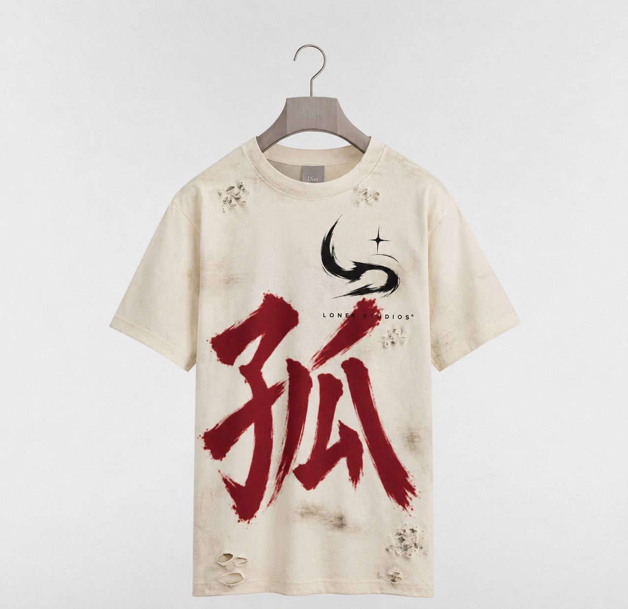 A beige T-shirt with a distressed look, featuring large red Japanese characters, a black stylized swirl, and the words "Loner Studios" in small black font. The shirt has small holes and some dirt-like stains.