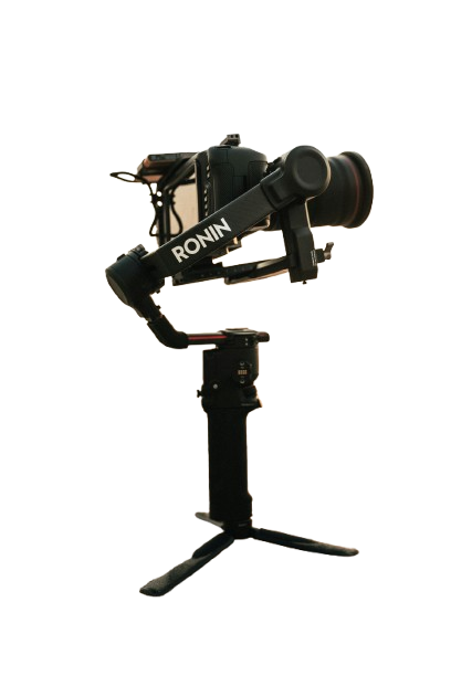 Camera mounted on a handheld stabilizer with the brand name Ronin visible.