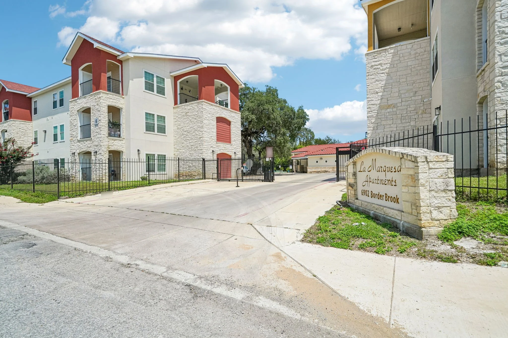 The gated entrance to La Marquesa Apartments on Border Brook in San Antonio, TX. Situated in Leon Valley nearby Ingram Park Mall and Loop 410.