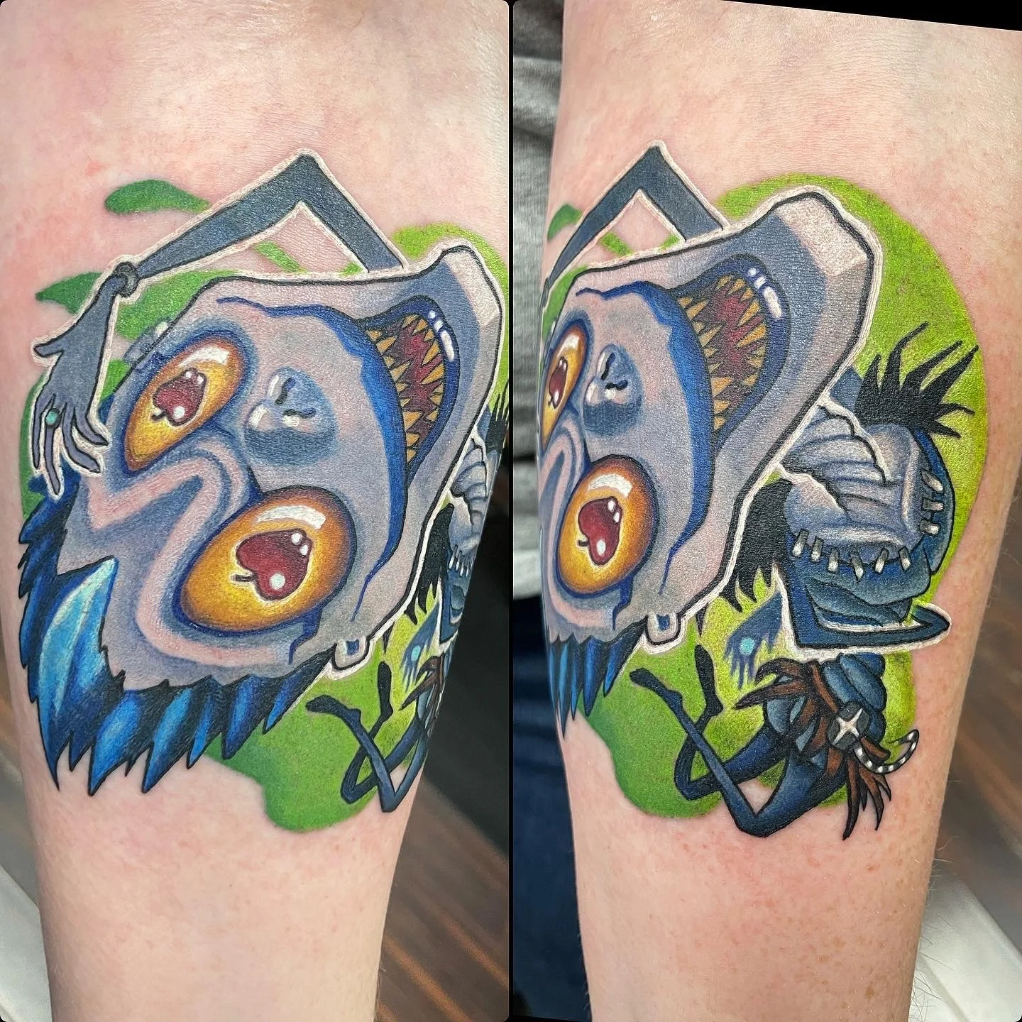 Colorful tattoo of a blue and gray creature with multiple yellow and orange eyes, set against a green background, on a person's arm.