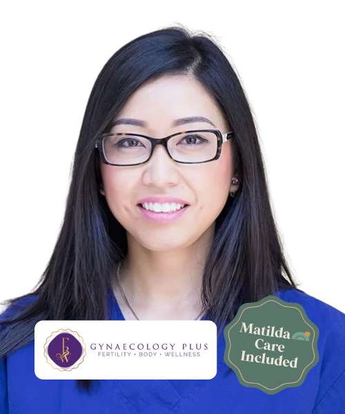 A woman with long dark hair, glasses, and a blue shirt smiling at the camera. There is a logo for Gynecology Plus and a badge indicating Matilda Care is included.