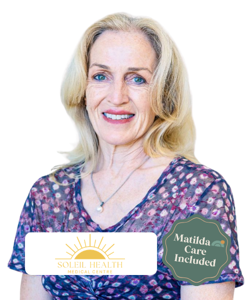 Portrait of a smiling woman with blonde hair wearing a blue patterned blouse, necklace with a pearl, and a 'Soleil Health Medical Centre' logo with a sun graphic, and a badge reading 'Matilda Care Included'.