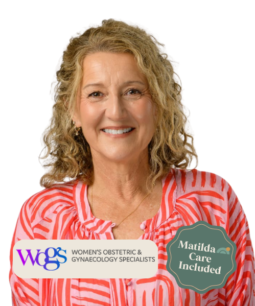 A smiling woman with curly blonde hair wearing a red and white striped blouse, with a badge indicating she is part of a women's obstetrics and gynecology specialty service and that matilda care is included.