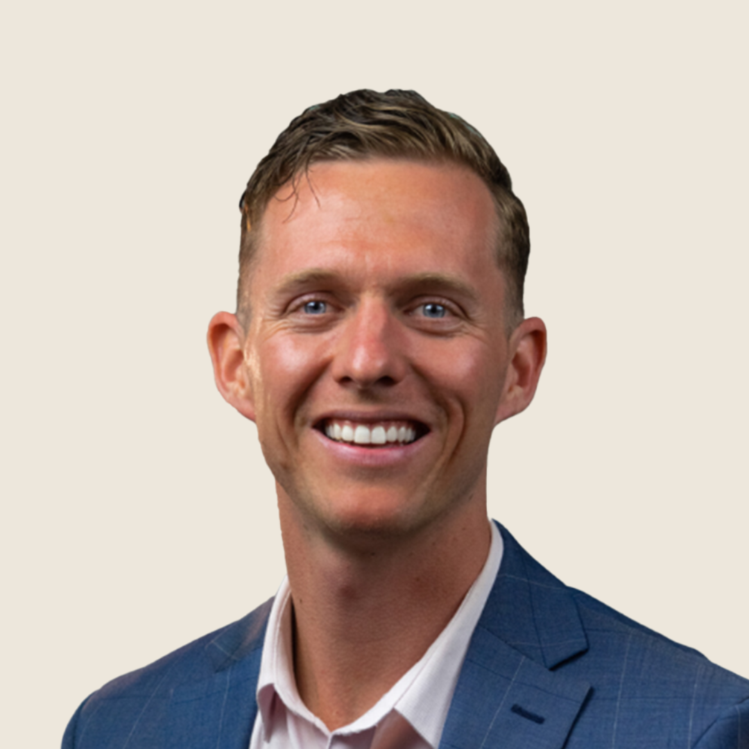 Headshot of a doctor Kevin Wernli in a blue suit
