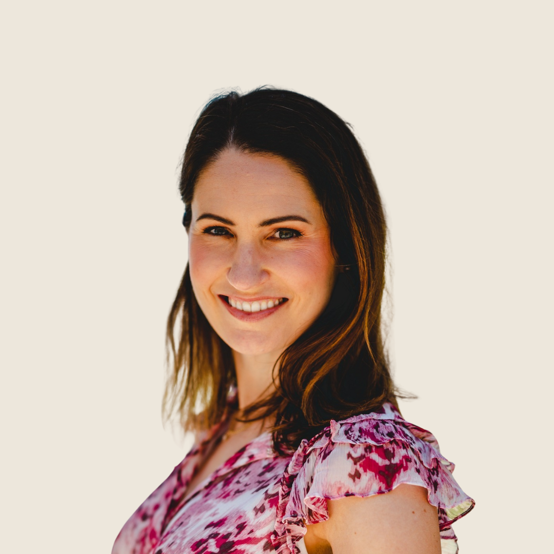 A headshot of doctor Rose Mcdonnell wearing a pink shirt