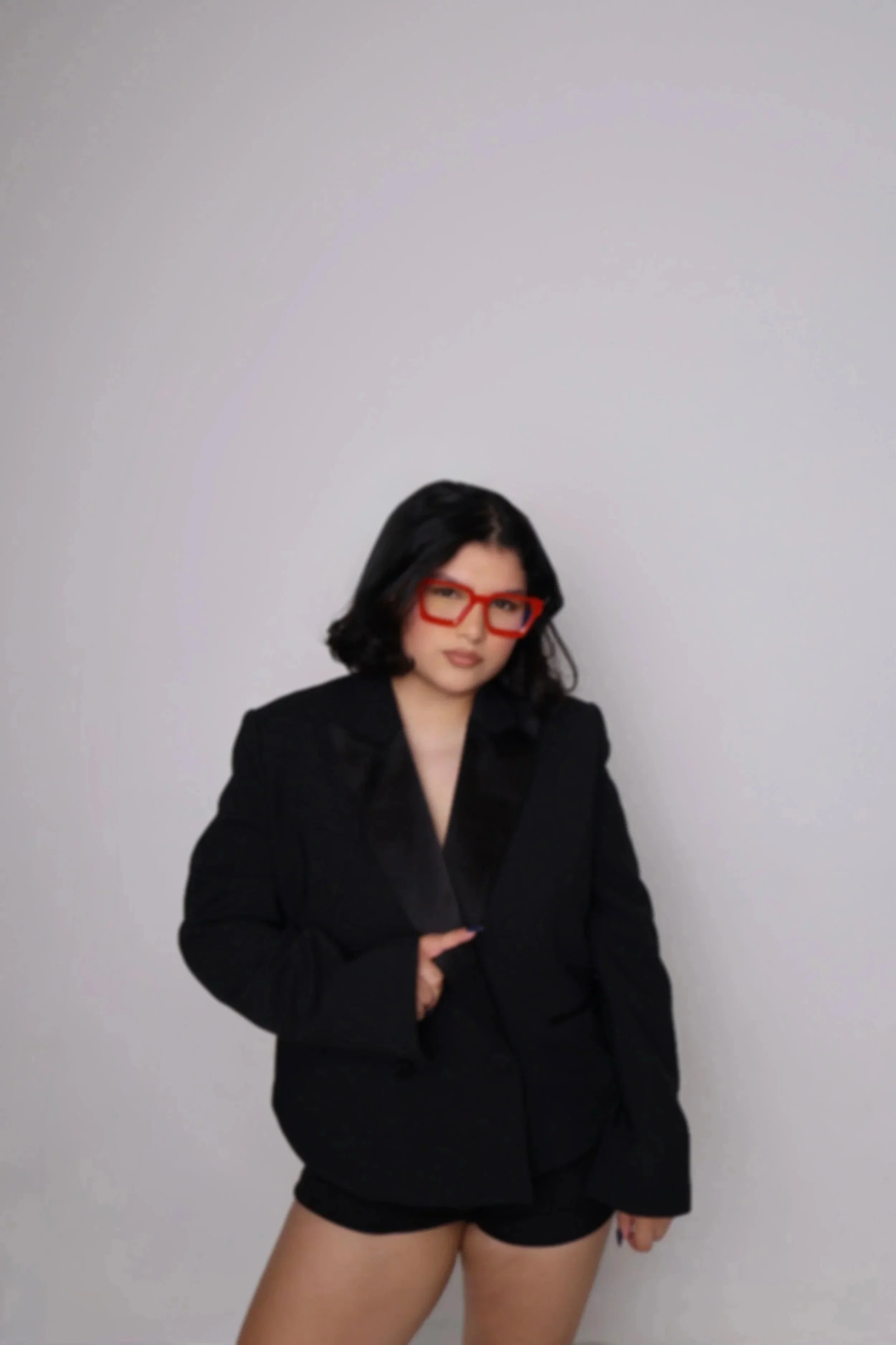 Studio portrait of Amiah Briseño, founder of Sixth Sense Creative, a San Antonio social media strategist and content creator.