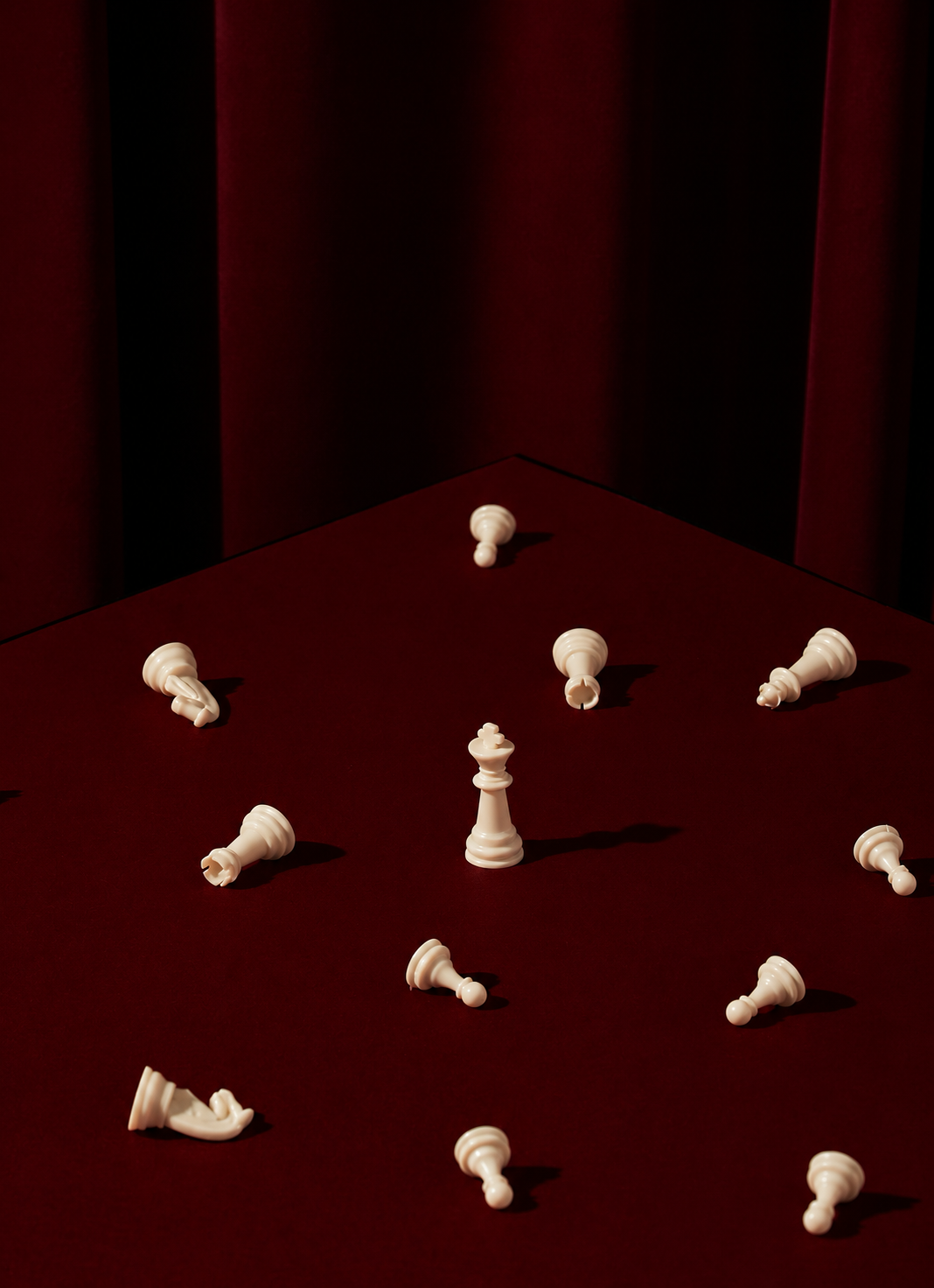 Creative strategy concept with a red chessboard and white chess pieces representing strategic social media marketing, brand strategy, content planning, and digital marketing services.