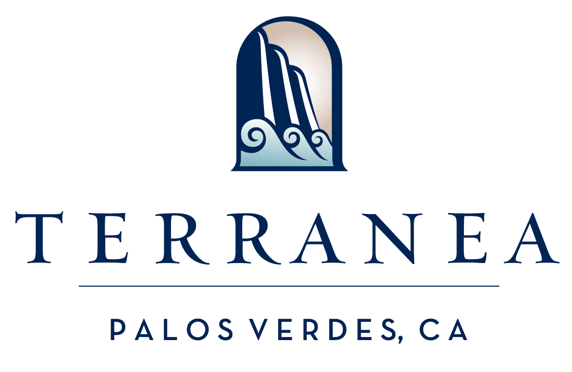 The logo of the Yellowstone National Park, featuring a stylized waterfall and mountain in shades of blue and gray.