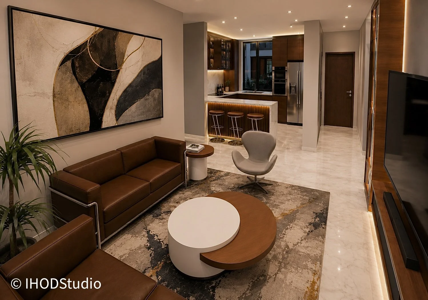 Modern open-concept living area with cognac leather sofas, a large abstract wall art, a round coffee table with a smaller oval section, an accent chair, and a kitchen in the background with dark wood cabinets, marble countertops, stainless steel appliances, and a breakfast bar with three stools