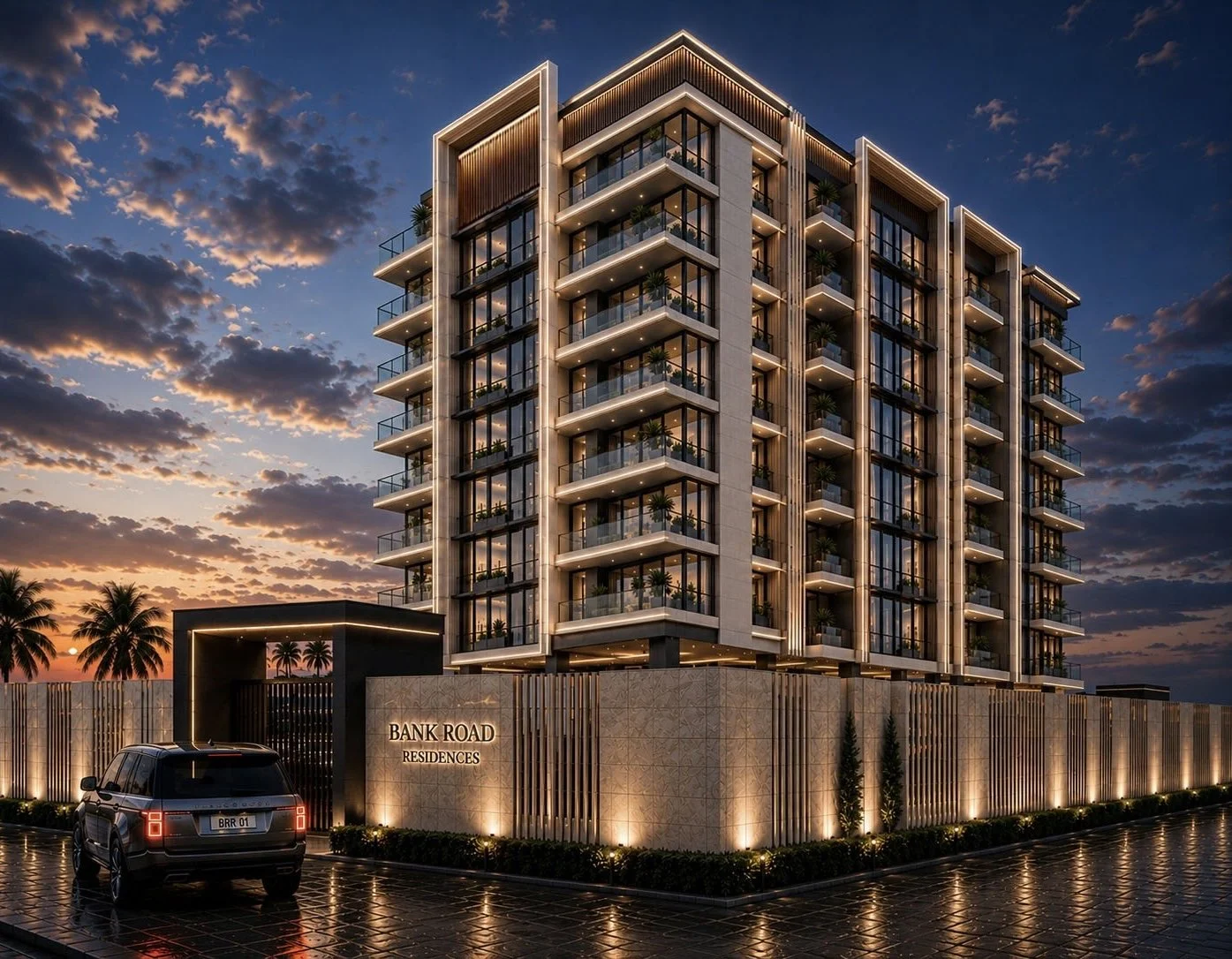 Modern multi-story residential building with balconies and glass railings, illuminated at dusk, with a sign reading 'Bank Road Residences' and a black vehicle parked in front, designed by IHOD.