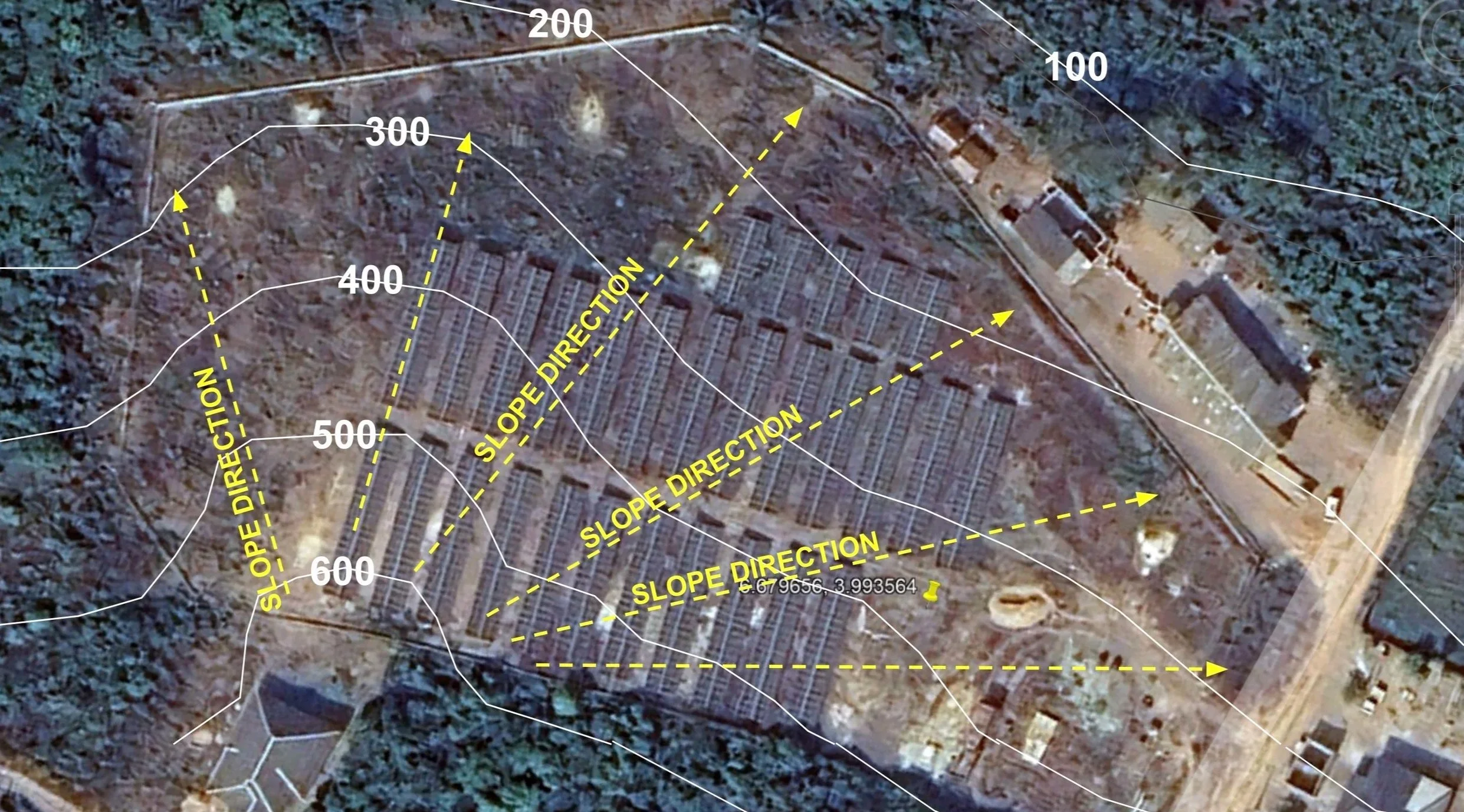 Aerial view of a construction site with overlays of topographic lines and slope direction markers in yellow, showing contour lines, scale measurements, and slope directions.