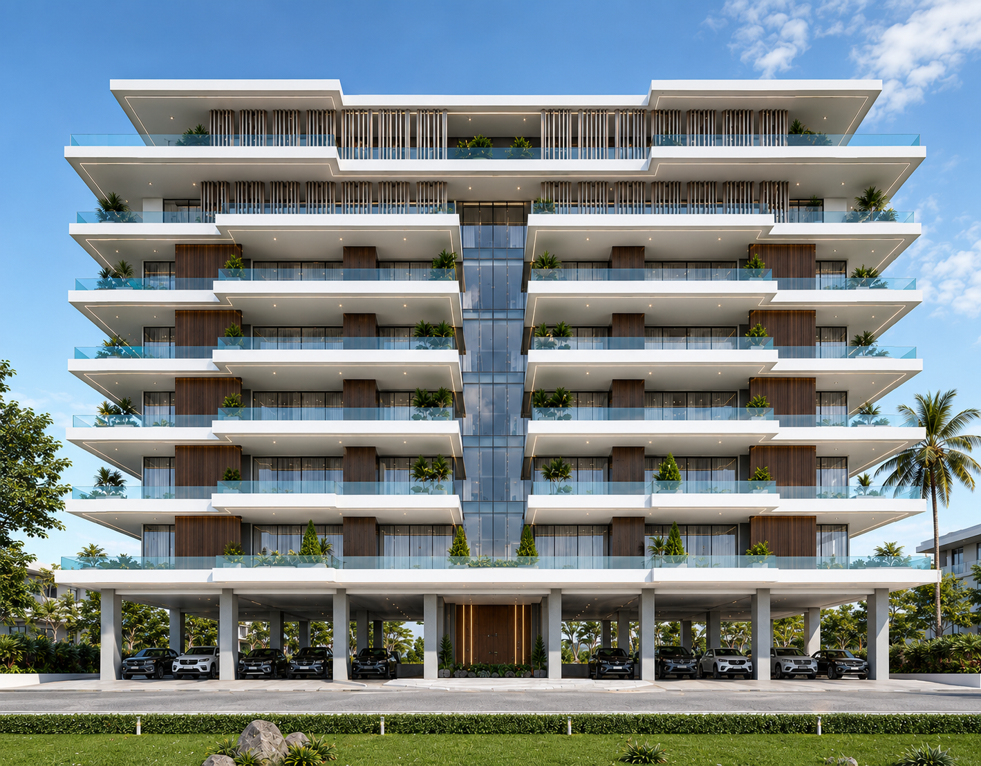 Modern multi-story residential building with glass balconies, wood accents, and a parking garage on the ground level, surrounded by landscaping and palm trees.