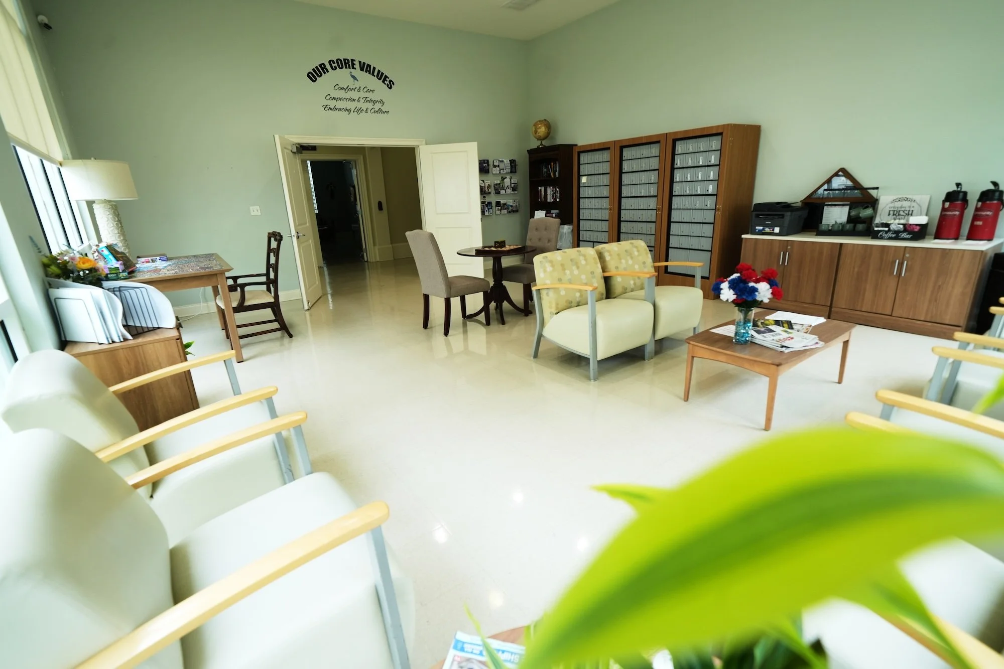 sunroom with plenty of seating for residents to socialize