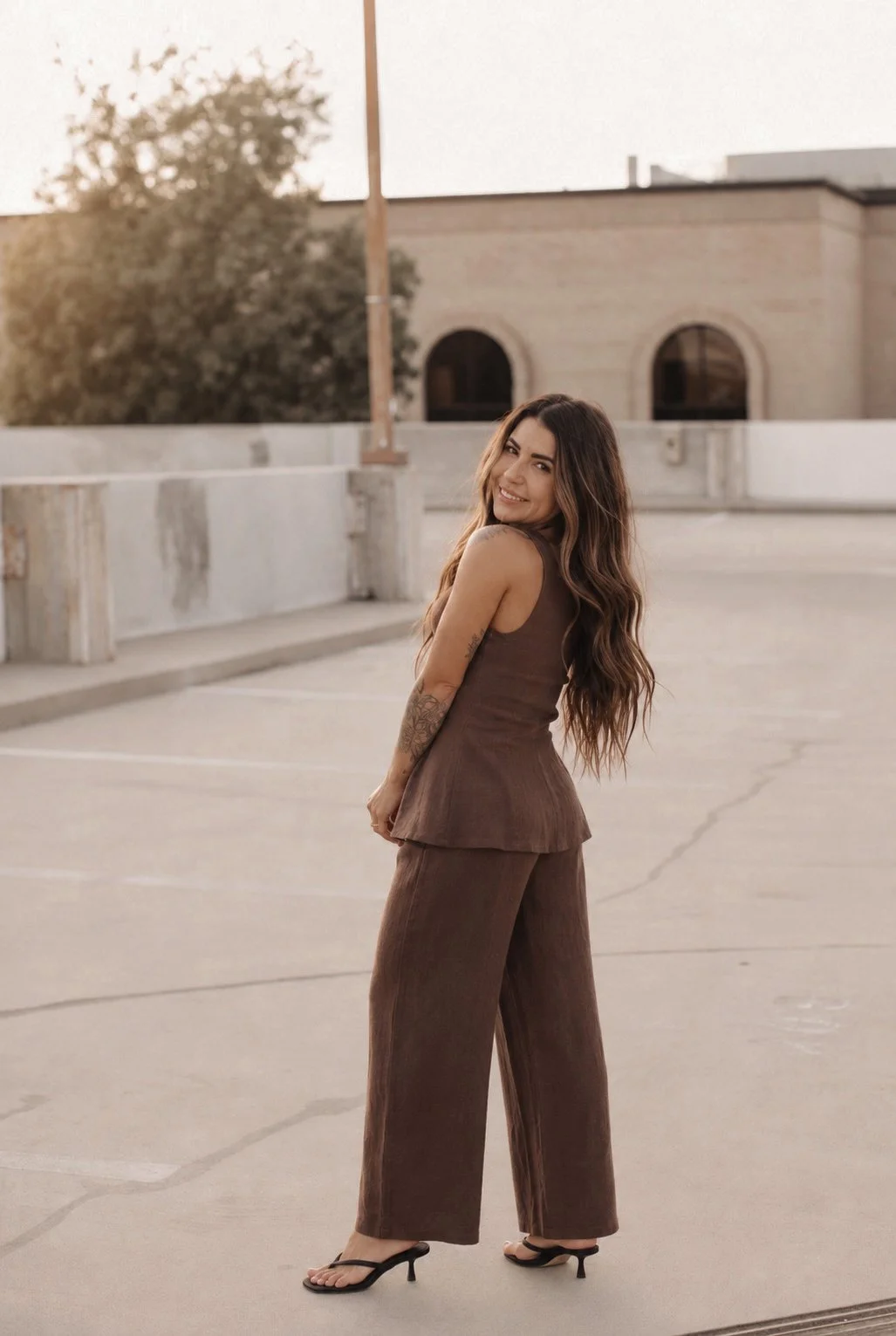 Amy, founder of Well, Lived Home, a California interior designer based in Central California, photographed at sunset.