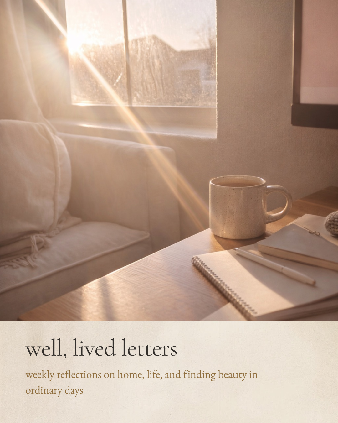Sunlight streaming through a window over a ceramic mug and notebook, capturing the calm and intentional lifestyle behind Well, Lived Home.