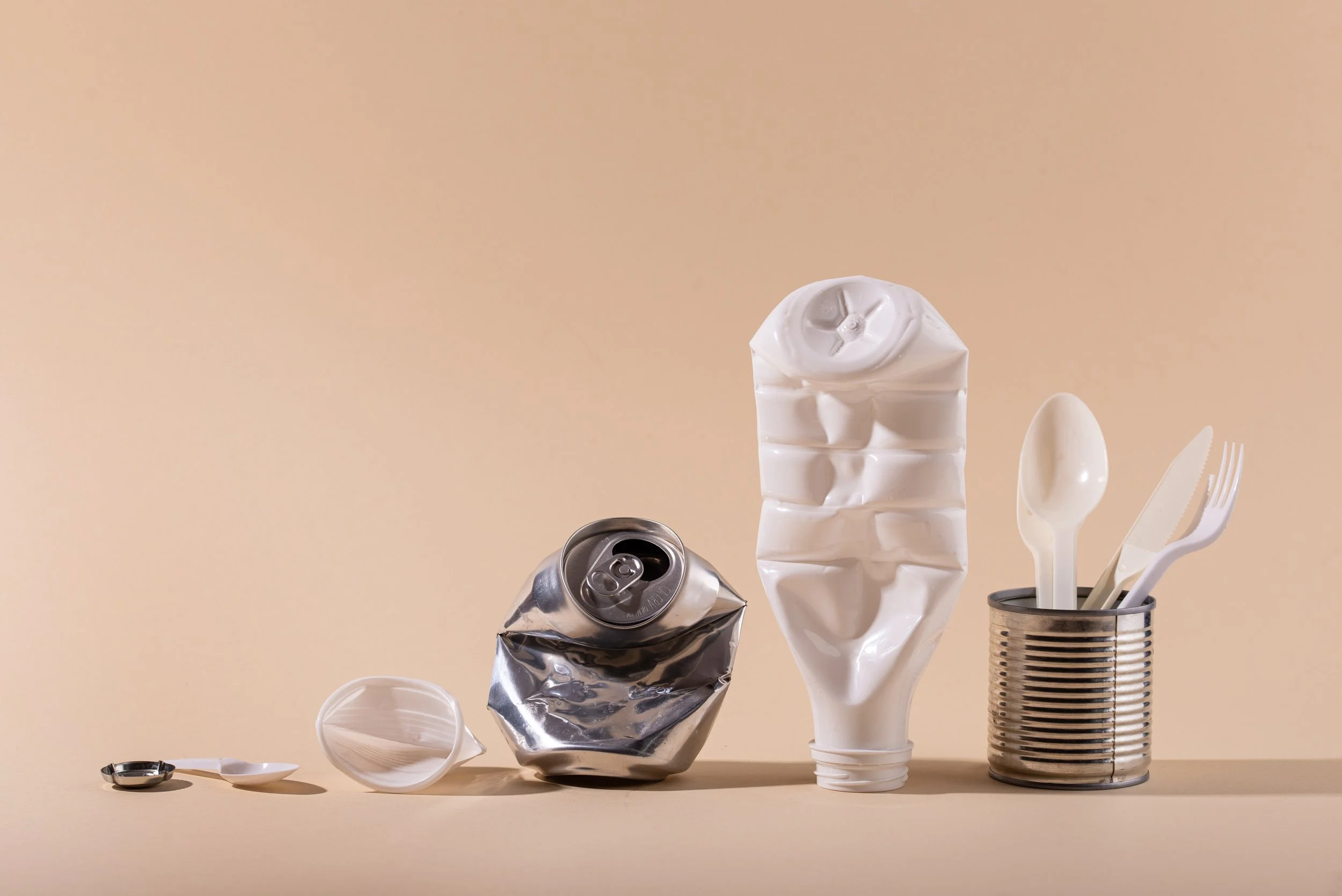 crushed-metal-and-plastic-waste-on-light-backgroun-2026-03-09-21-45-19-utc.jpg