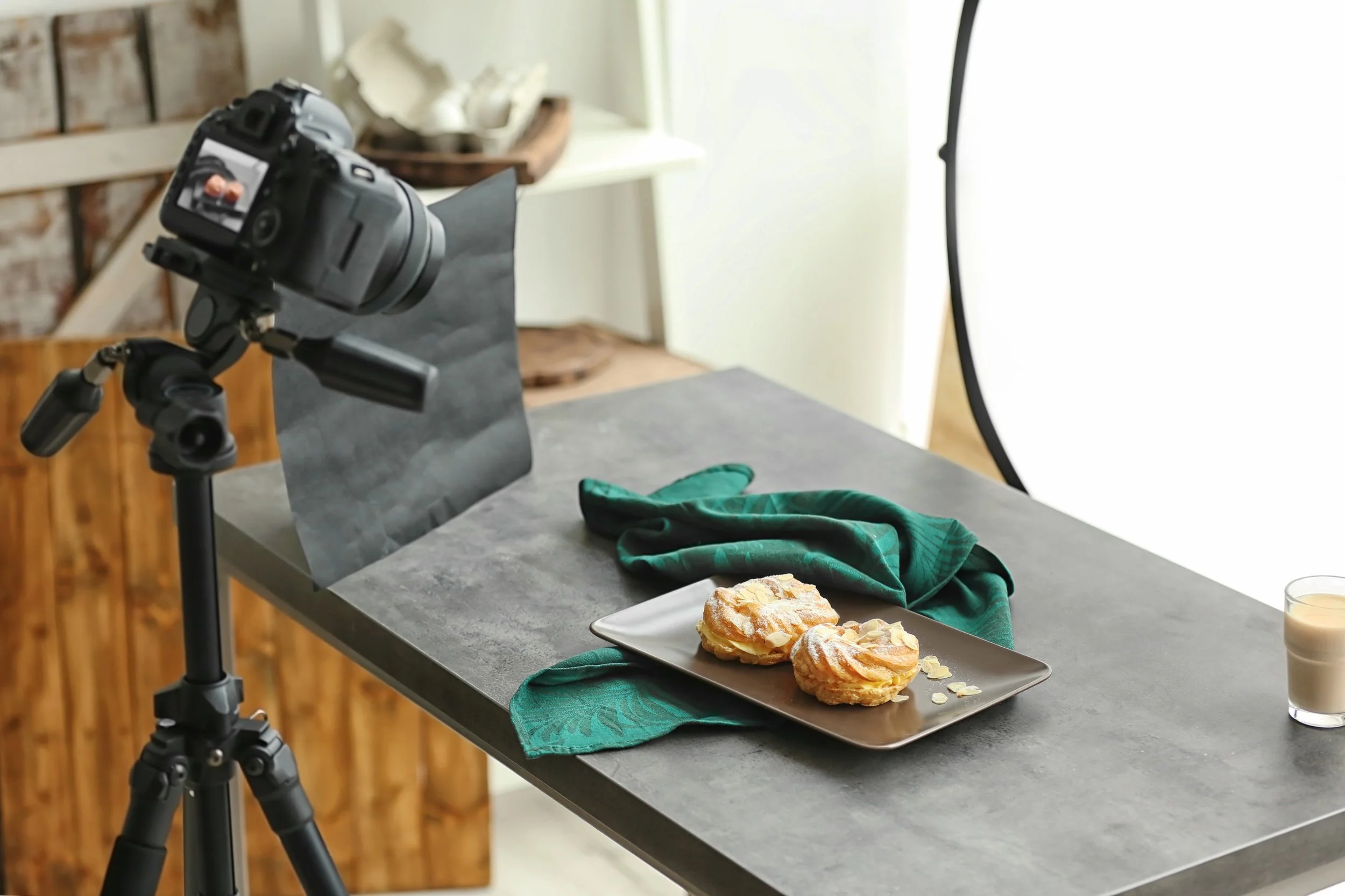 cream-puffs-dessert-on-table-with-camera-setup-2026-03-27-00-48-54-utc.jpg