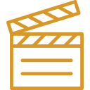 A graphic of a film clapperboard with empty space for text