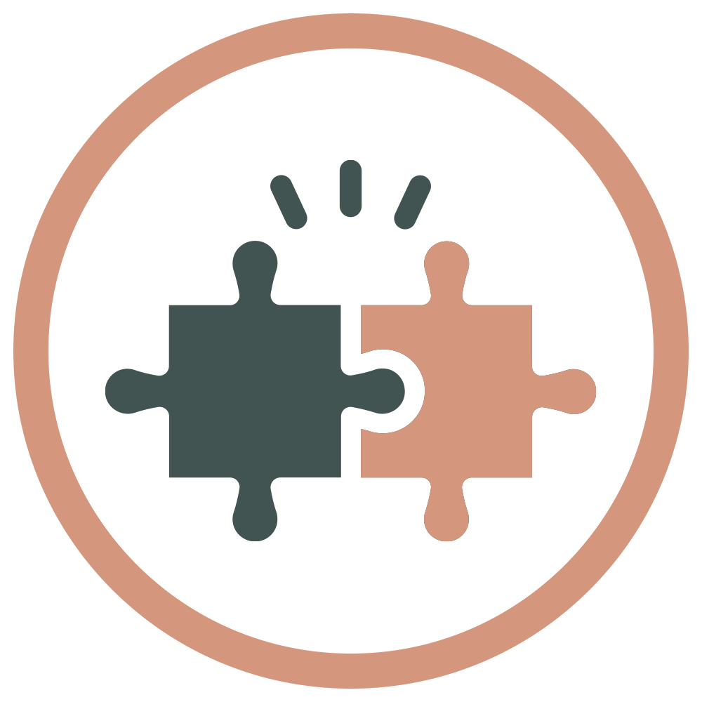 Two puzzle pieces, one dark green and one light peach, fitting together inside a circle with a light peach border.